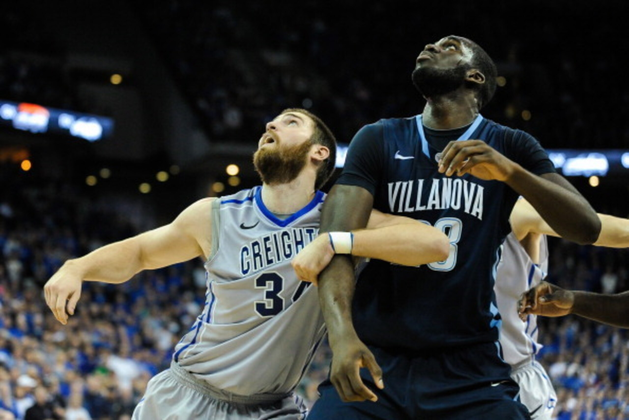 OMAHA, NE - FEBRUARY 16: Ethan Wragge #34 of the Creighton Bluejays and Daniel Ochefu #23 of the Villanova Wildcats fights for position during their game at CenturyLink Center on February 16, 2014 in Omaha, Nebraska. (Photo by Eric Francis/Getty Images)