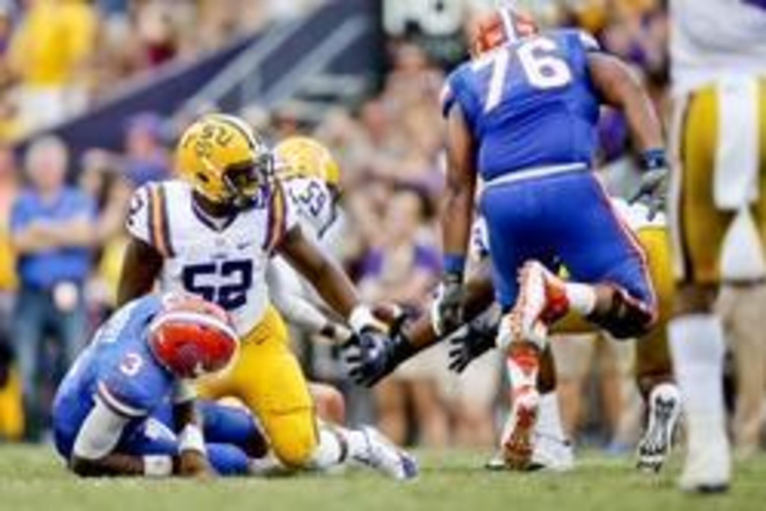 Oct 12, 2013; Baton Rouge, LA, USA; LSU Tigers linebacker Kendell Beckwith (52) looks on after causing a fumble on a sack against Florida Gators quarterback Tyler Murphy (3) on a fourth down play during the fourth quarter of a game at Tiger Stadium. LSU d Oct 12, 2013; Baton Rouge, LA, USA; LSU Tigers linebacker Kendell Beckwith (52) looks on after causing a fumble on a sack against Florida Gators quarterback Tyler Murphy (3) on a fourth down play during the fourth quarter of a game at Tiger Stadium. LSU d