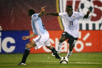 EAST RUTHERFORD, NJ - JUNE 08:  Freddy Adu #19  of the United States of America drives the ball past Javier Zanetti #8  of Argentina during their match at Giants Stadium on June 8, 2008 in East Rutherford, New Jersey.  (Photo by Al Bello/Getty Images)