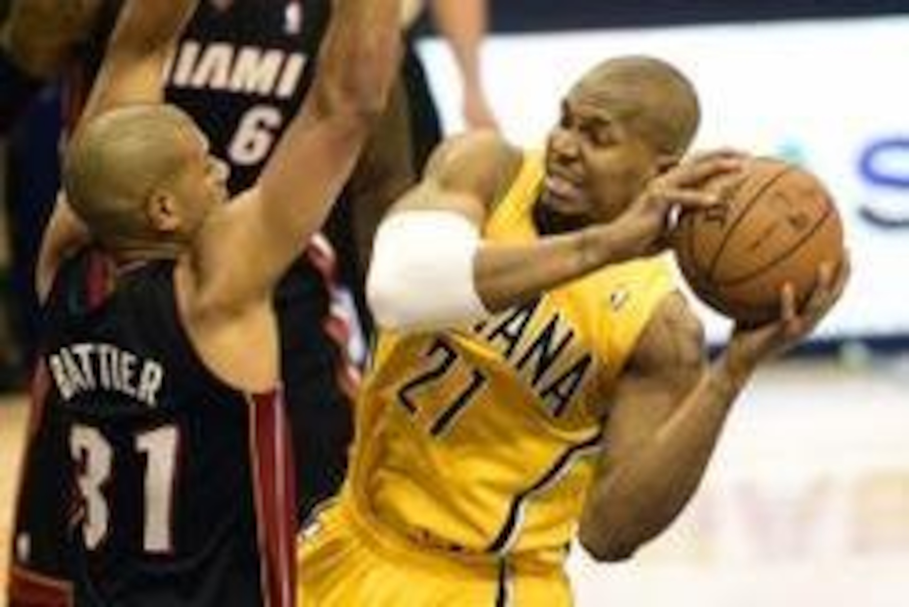May 20, 2014; Indianapolis, IN, USA; Indiana Pacers forward David West (21) looks for an open teammate against Miami Heat forward Shane Battier (31) underneath the basket during the first quarter of game two of the Eastern Conference Finals of the 2014 NB