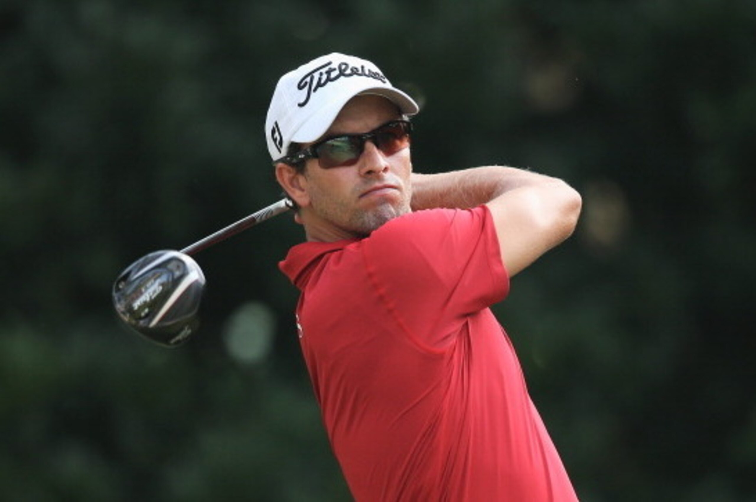 PONTE VEDRA BEACH, FL - MAY 09:  Adam Scott of Australia watches his tee shot on the 11th hole during the second round of THE PLAYERS Championship on The Stadium Course at TPC Sawgrass on May 9, 2014 in Ponte Vedra Beach, Florida.  (Photo by Richard Heath