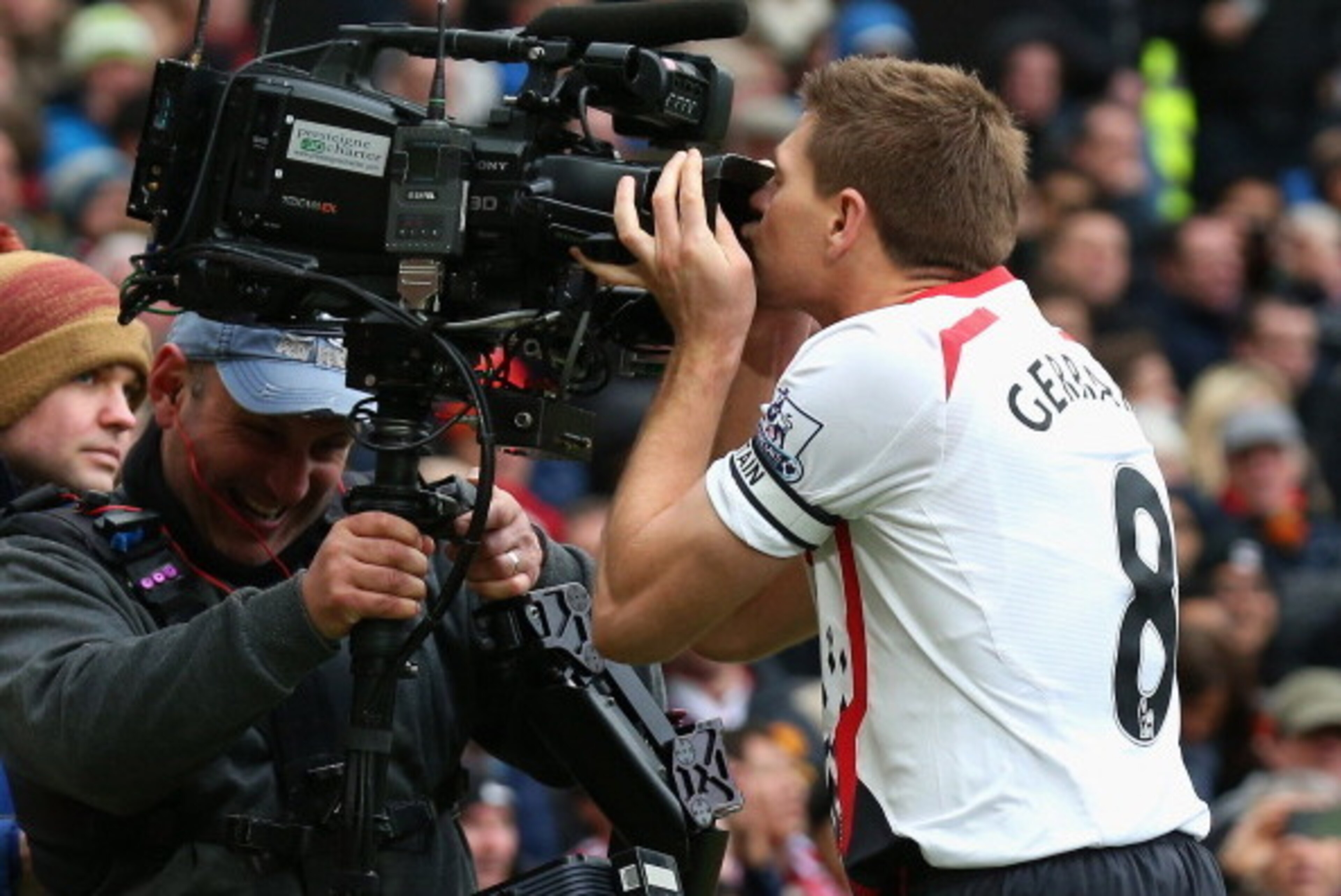 MANCHESTER, ENGLAND - MARCH 16:  Steven Gerrard of Liverpool celebrates scoring the second goal by kissing the steadicam during the Barclays Premier League match between Manchester United and Liverpool at Old Trafford on March 16, 2014 in Manchester, Engl
