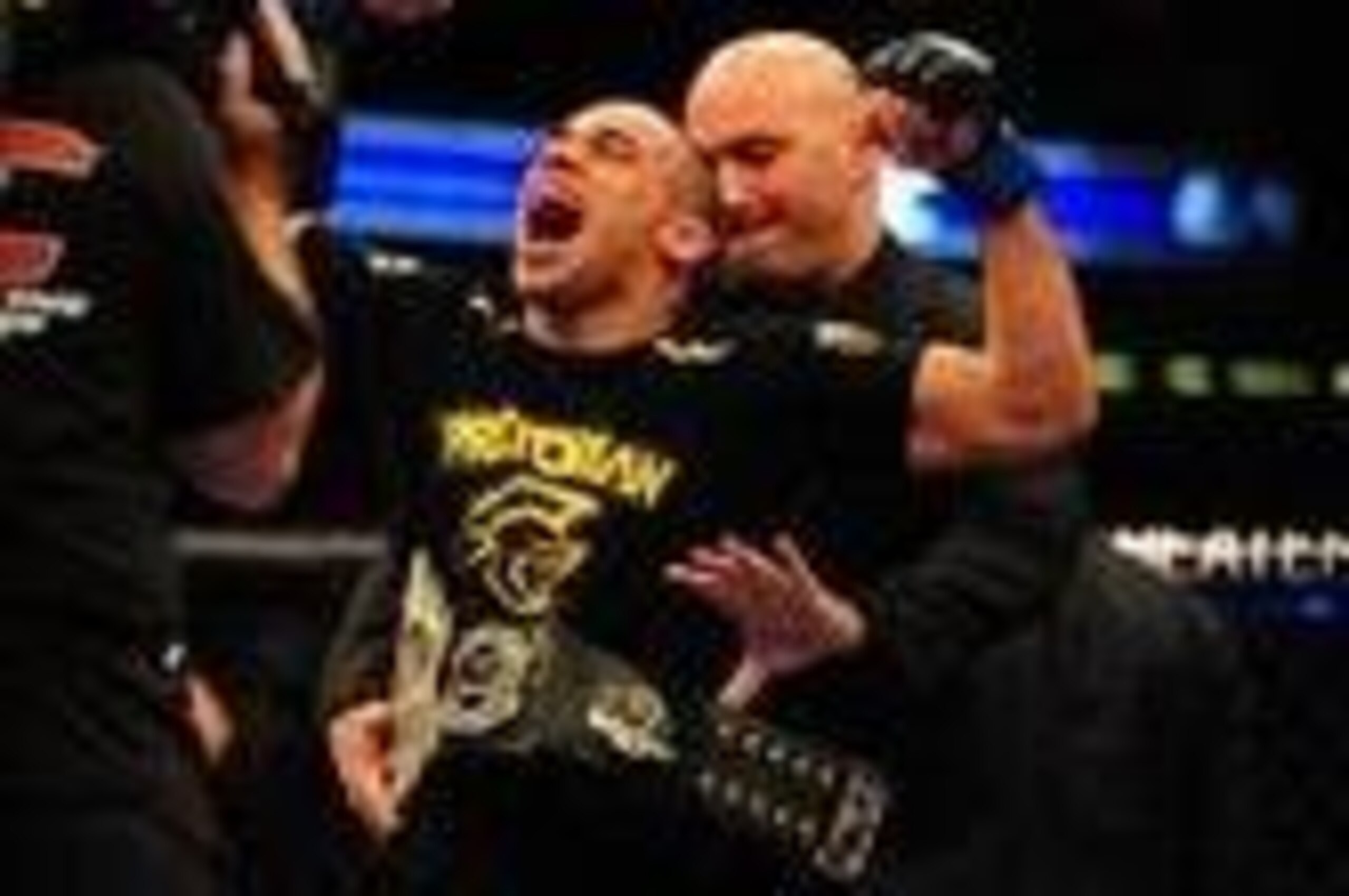Jul 21, 2012; Calgary, AB, CANADA; Renan Barao celebrates defeating Urijah Faber (not pictured) in the interim bantamweight title bout of UFC 149 at the Scotiabank Saddledome. Mandatory Credit: Anne-Marie Sorvin-USA TODAY Sports