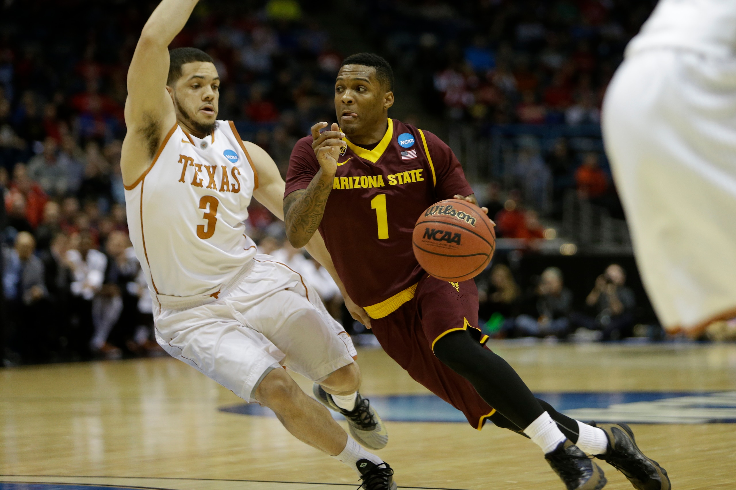 MILWAUKEE, WI - MARCH 20: Jahii Carson #1 of the Arizona State Sun Devils drives to the hoop in the second half against the Texas Longhorns during the game at BMO Harris Bradley Center on March 20, 2014 in Madison, Wisconsin. (Photo by Mike McGinnis/Getty MILWAUKEE, WI - MARCH 20: Jahii Carson #1 of the Arizona State Sun Devils drives to the hoop in the second half against the Texas Longhorns during the game at BMO Harris Bradley Center on March 20, 2014 in Madison, Wisconsin. (Photo by Mike McGinnis/Getty