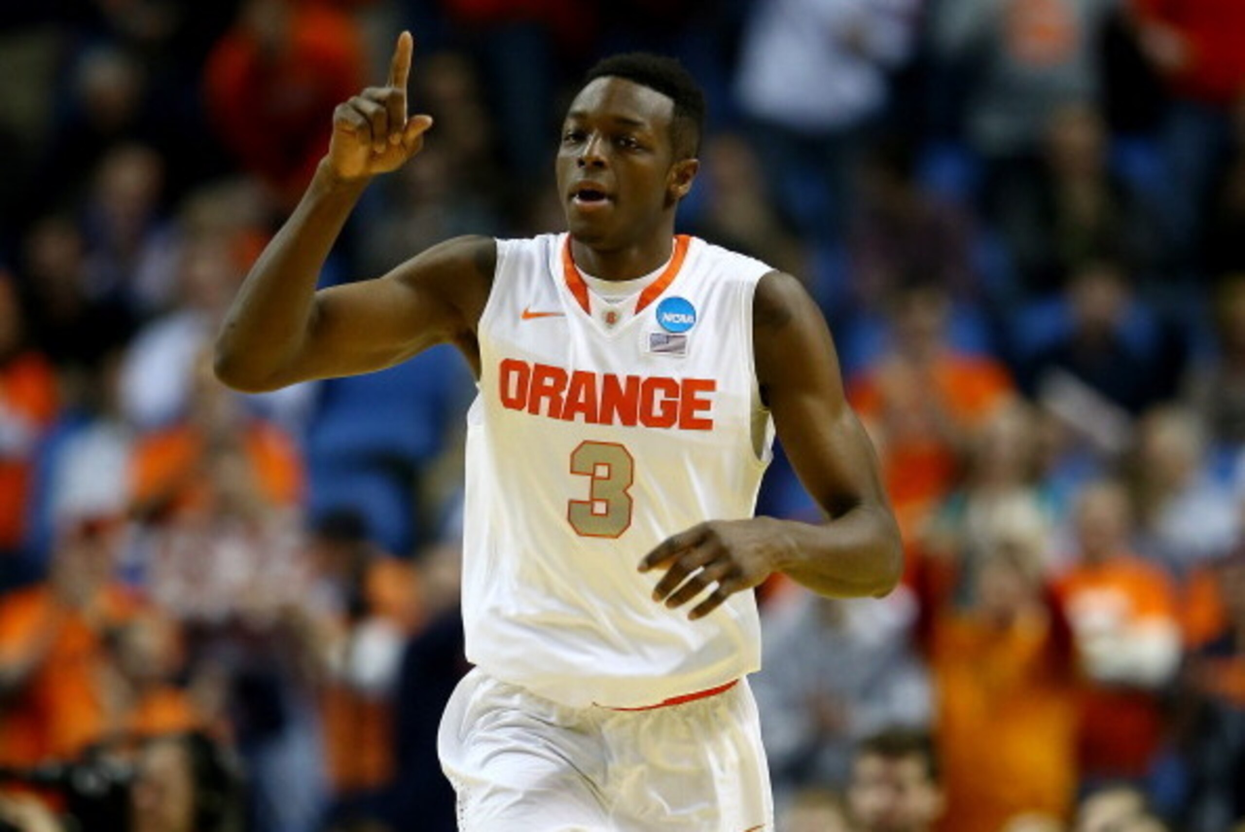 BUFFALO, NY - MARCH 20:  Jerami Grant #3 of the Syracuse Orange reacts against the Western Michigan Broncos during the second round of the 2014 NCAA Men's Basketball Tournament at the First Niagara Center on March 20, 2014 in Buffalo, New York.  (Photo by