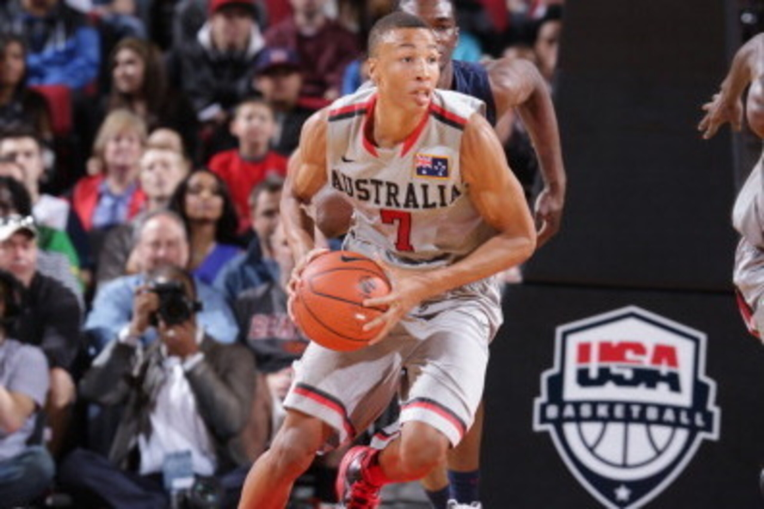 PORTLAND, OR - APRIL 20: Dante Exum #7 on the World Select Team drives against the USA Junior Select Team during the game on April 20, 2013 at the Rose Garden Arena in Portland, Oregon. NOTE TO USER: User expressly acknowledges and agrees that, by downloa