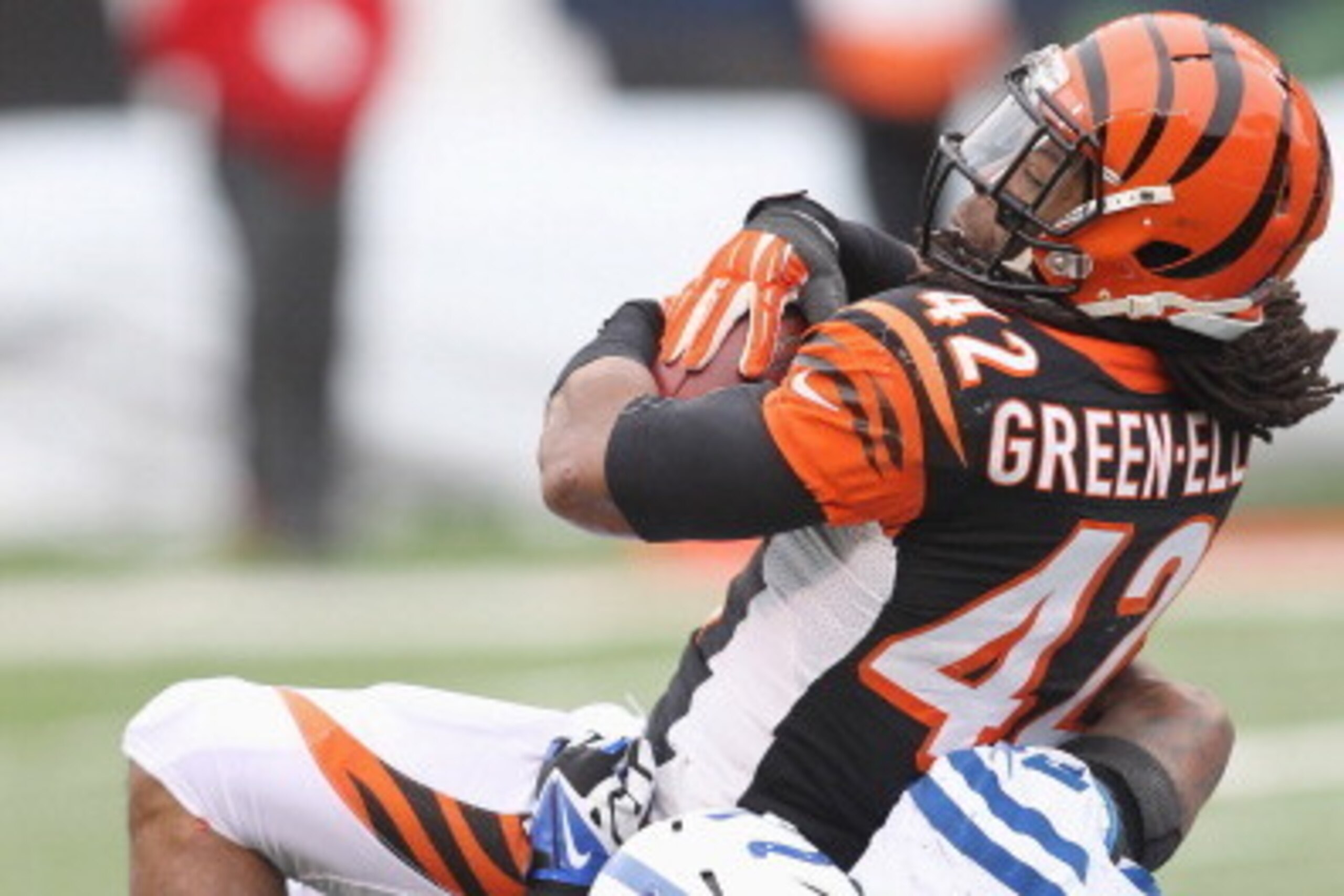 CINCINNATI, OH - DECEMBER 08:  BenJarvus Green-Ellis #42 of the Cincinnati Bengals is tackled by Antoine Bethea #41 of the Indianapolis Colts during their game at Paul Brown Stadium on December 8, 2013 in Cincinnati, Ohio.  The Bengals defeated the Colts 
