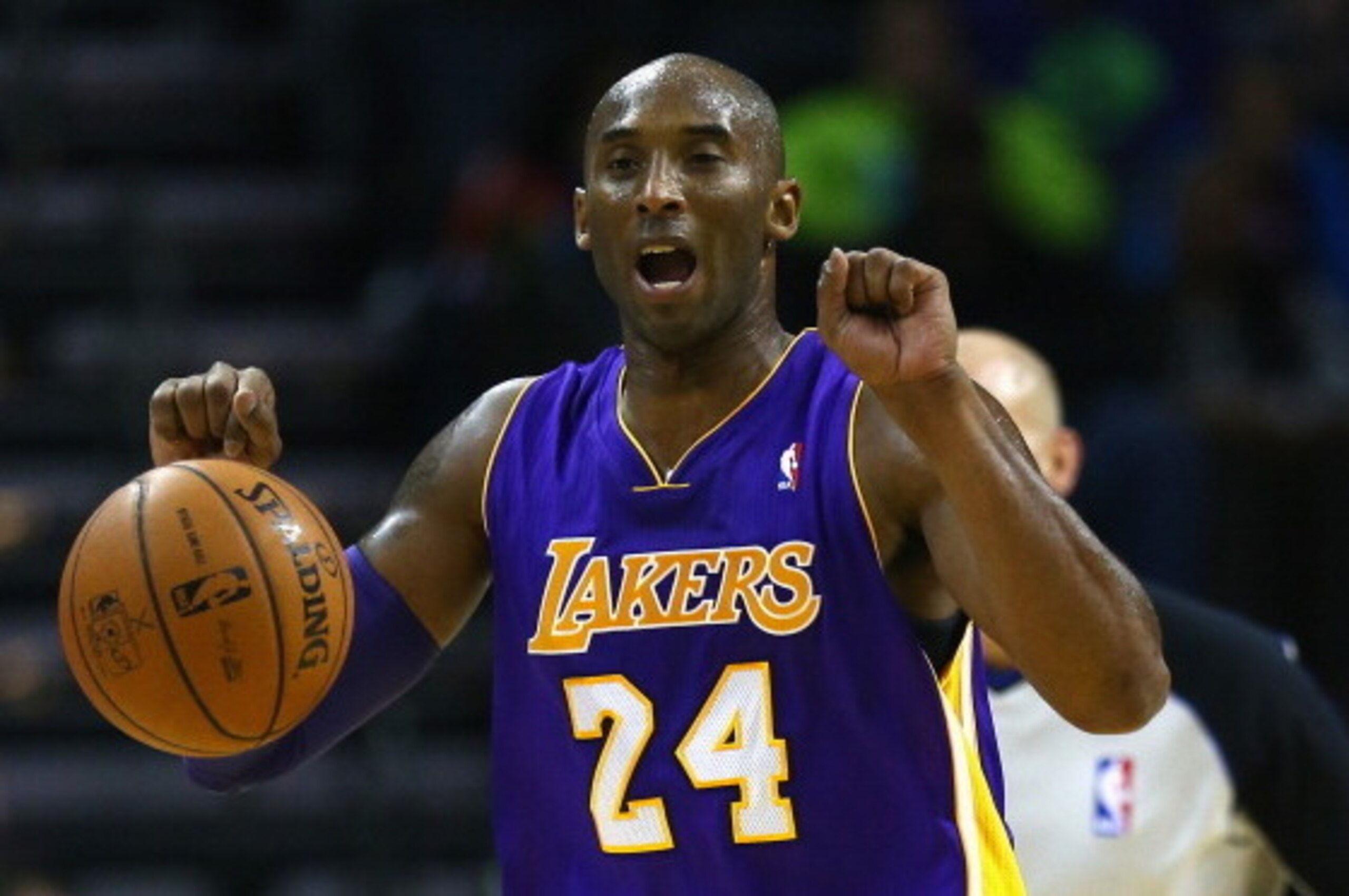CHARLOTTE, NC - DECEMBER 14: Kobe Bryant #24 of the Los Angeles Lakers during their game at Time Warner Cable Arena on December 14, 2013 in Charlotte, North Carolina. NOTE TO USER: User expressly acknowledges and agrees that, by downloading and or using CHARLOTTE, NC - DECEMBER 14: Kobe Bryant #24 of the Los Angeles Lakers during their game at Time Warner Cable Arena on December 14, 2013 in Charlotte, North Carolina. NOTE TO USER: User expressly acknowledges and agrees that, by downloading and or using