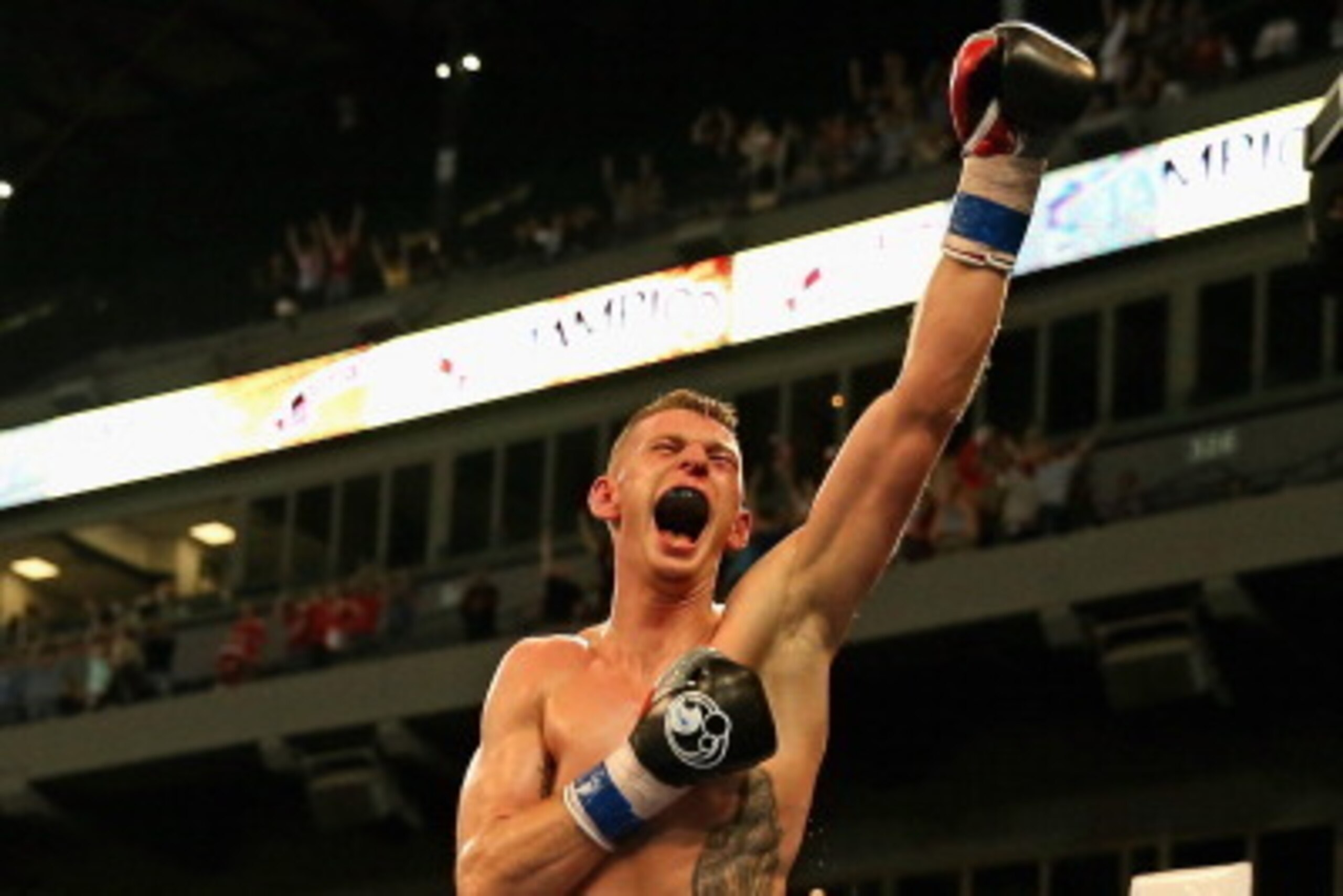 CHICAGO, IL - AUGUST 16: Andrzej Fonfara celebrates his Light Heavyweight knock out win over Gabriel Campillo during an outdoor boxing event at U.S. Cellular Field on August 16, 2013 in Chicago, Illinois. (Photo by Jonathan Daniel/Getty Images) CHICAGO, IL - AUGUST 16: Andrzej Fonfara celebrates his Light Heavyweight knock out win over Gabriel Campillo during an outdoor boxing event at U.S. Cellular Field on August 16, 2013 in Chicago, Illinois. (Photo by Jonathan Daniel/Getty Images)