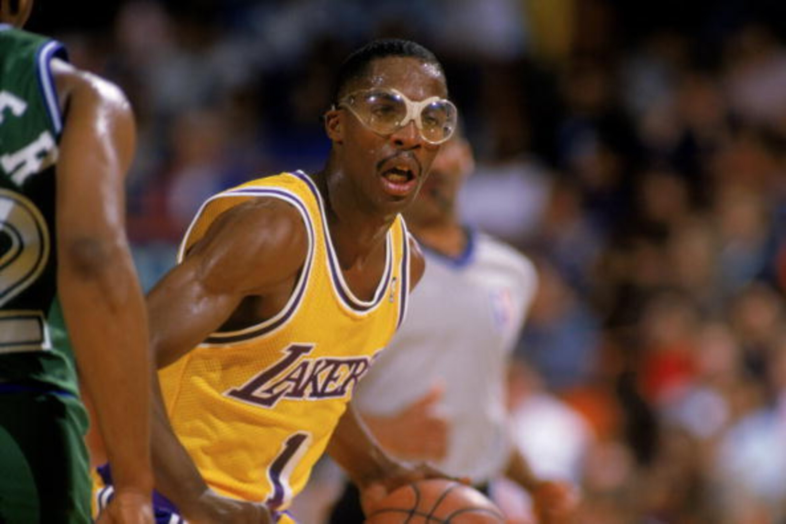 LOS ANGELES - 1987:  Wes Matthews #1 of the Los Angeles Lakers dribbles the ball during an NBA game against the Dallas Mavericks at the Great Western Forum in Los Angeles, California in 1987. (Photo by: Stephen Dunn/Getty Images)