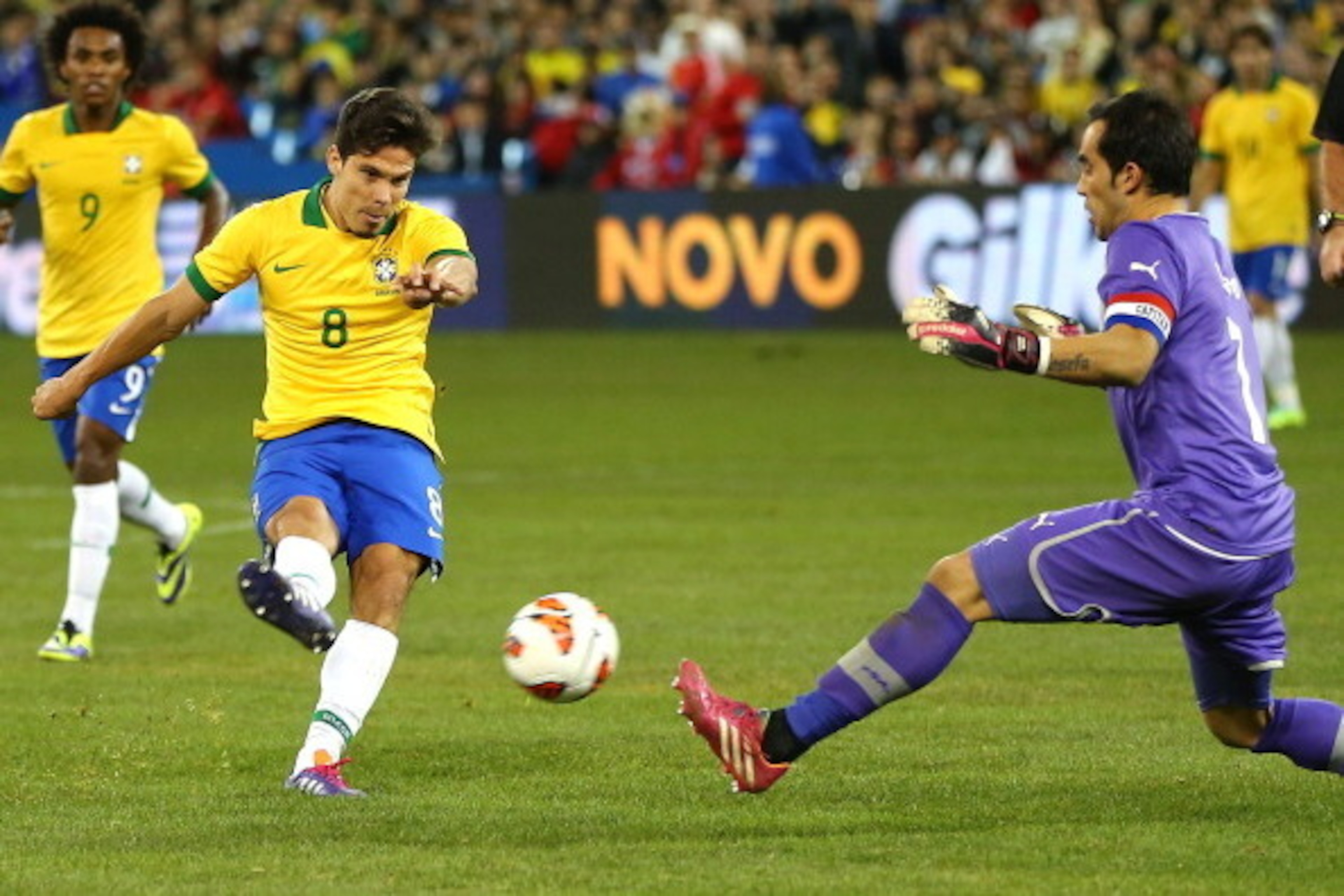 TORONTO, ON - NOVEMBER 19: Hernanes #8 of Brazil tries to get a shot past Claudio Bravo #1 of Chile during a friendly match at Rogers Centre on November 19, 2013 in Toronto, Canada.Brazil defeated Chile 2-1. (Photo by Elsa/Getty Images) TORONTO, ON - NOVEMBER 19: Hernanes #8 of Brazil tries to get a shot past Claudio Bravo #1 of Chile during a friendly match at Rogers Centre on November 19, 2013 in Toronto, Canada.Brazil defeated Chile 2-1. (Photo by Elsa/Getty Images)