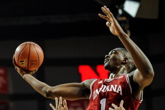 LINCOLN, NE - JANUARY 30: Noah Vonleh #1 of the Indiana Hoosiers drives to the basket over Shavon Shields #31 of the Nebraska Cornhuskers during their game at Pinnacle Bank Arena on January 30, 2014 in Lincoln, Nebraska. (Photo by Eric Francis/Getty Image