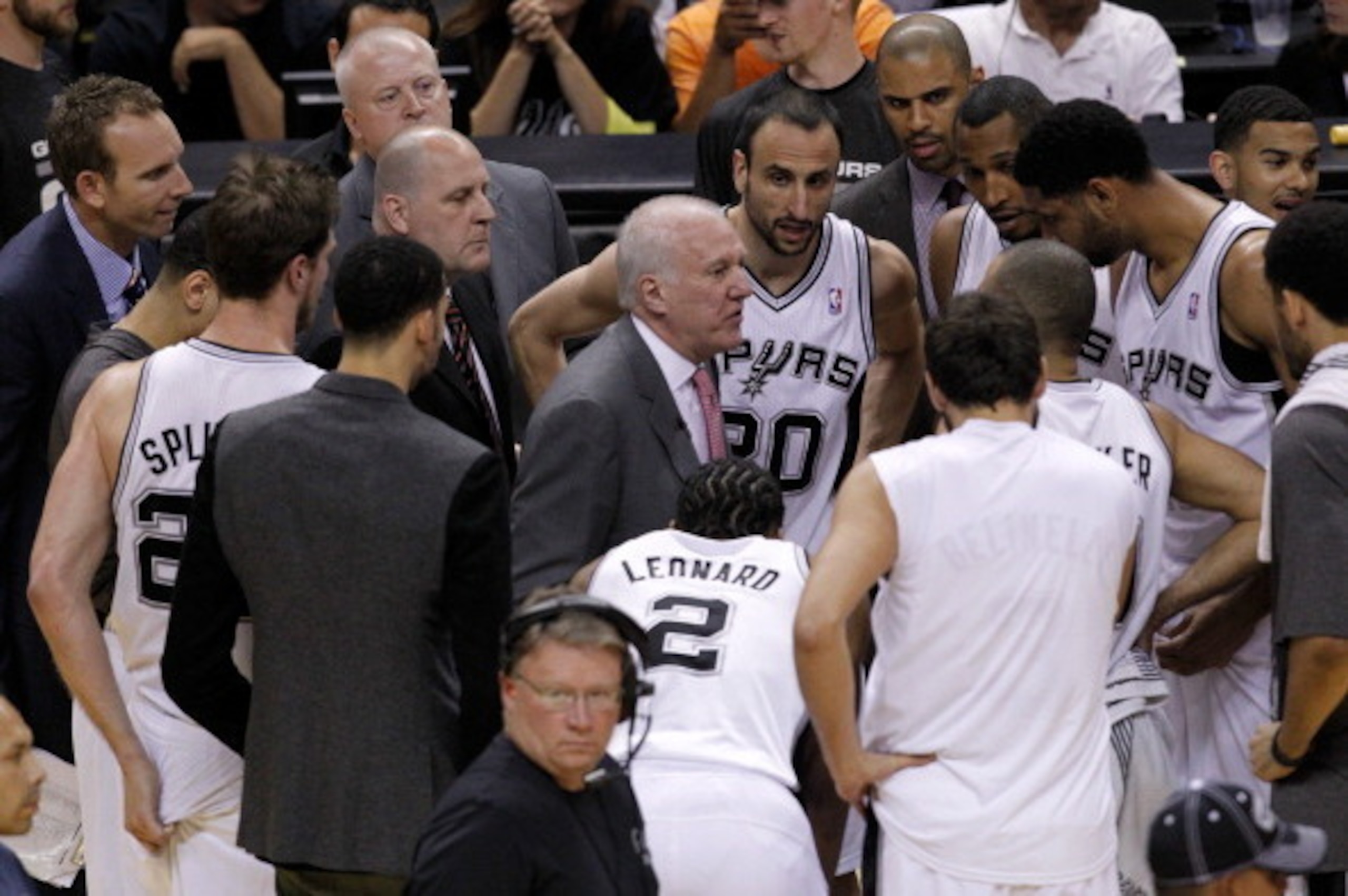 SAN ANTONIO, TX - MAY 19: Head coach Gregg Popovich of the San Antonio Spurs talks with his team during a time out in the first half while taking on the Oklahoma City Thunder in Game One of the Western Conference Finals during the 2014 NBA Playoffs at AT SAN ANTONIO, TX - MAY 19: Head coach Gregg Popovich of the San Antonio Spurs talks with his team during a time out in the first half while taking on the Oklahoma City Thunder in Game One of the Western Conference Finals during the 2014 NBA Playoffs at AT