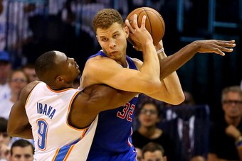 OKLAHOMA CITY, OK - MAY 13:  Serge Ibaka #9 of the Oklahoma City Thunder defends Blake Griffin #32 of the Los Angeles Clippers in Game Five of the Western Conference Semifinals during the 2014 NBA Playoffs at Chesapeake Energy Arena on May 13, 2014 in Okl