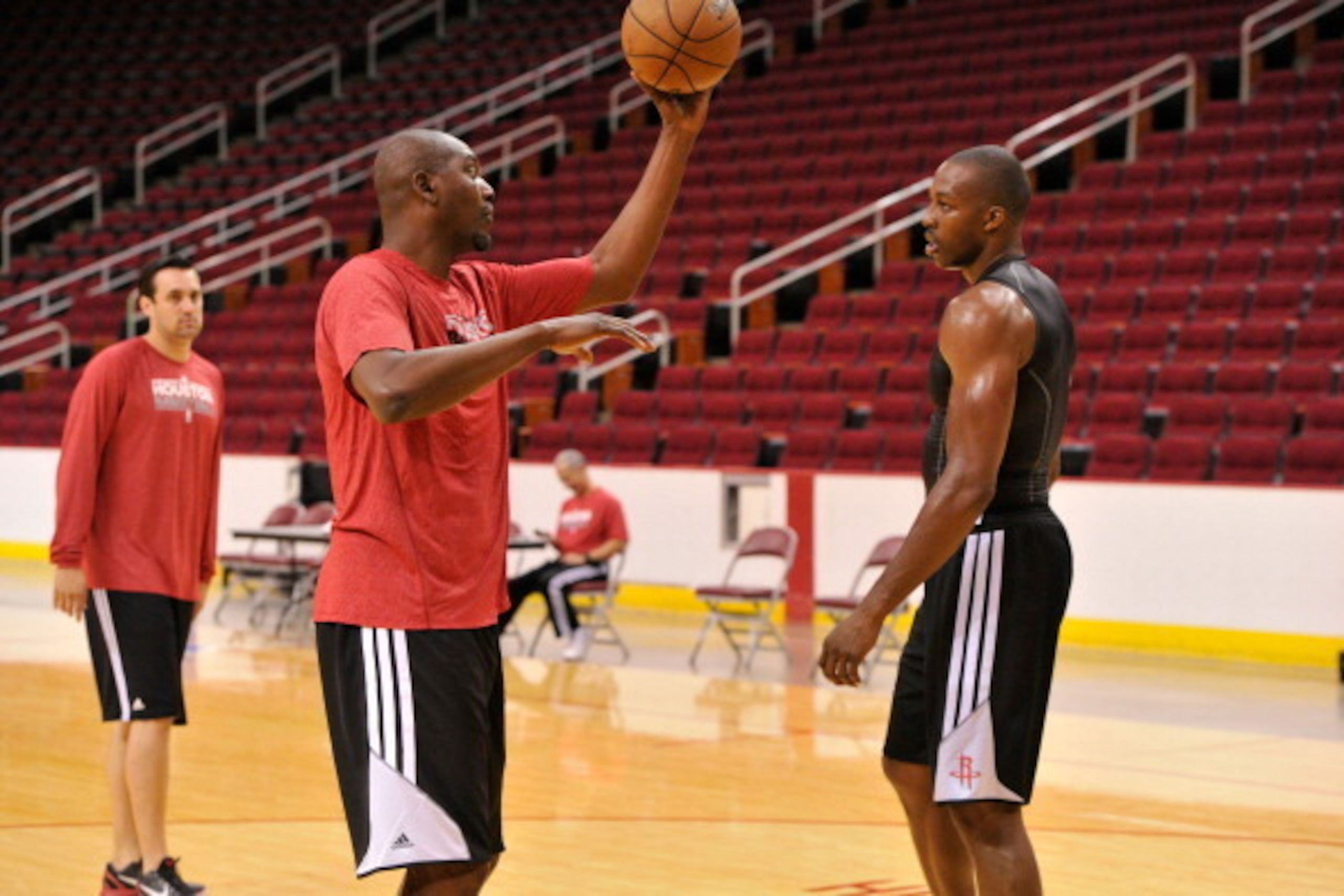 HOUSTON, TX - JULY 13, 2013: Dwight Howard of the Houston Rockets works out with Hakeem Olajuwon on August 13, 2013 at The Toyota Center Houston, Texas. NOTE TO USER: User expressly acknowledges and agrees that, by downloading and or using this photograph