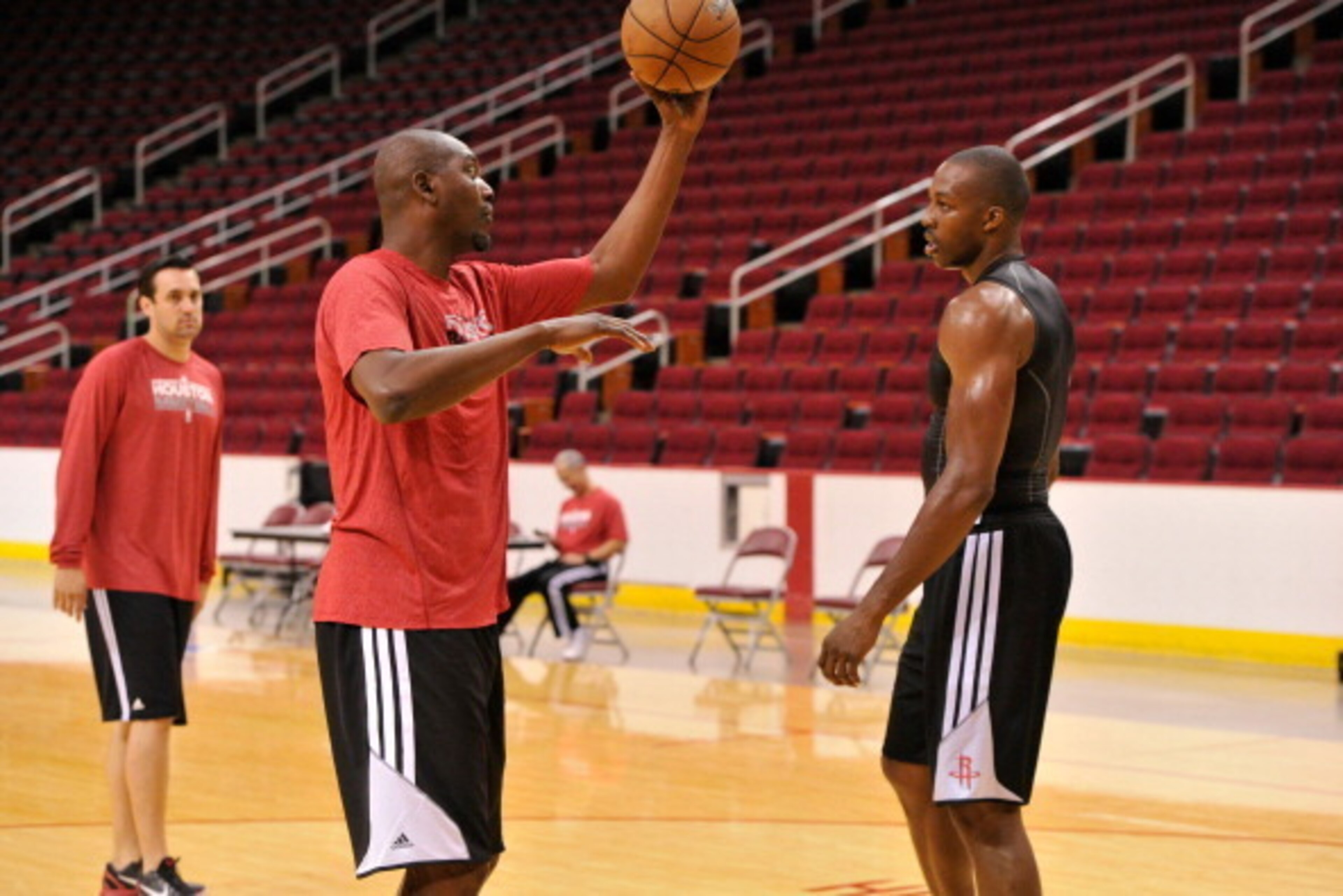 HOUSTON, TX - JULY 13, 2013: Dwight Howard of the Houston Rockets works out with Hakeem Olajuwon on August 13, 2013 at The Toyota Center Houston, Texas. NOTE TO USER: User expressly acknowledges and agrees that, by downloading and or using this photograph