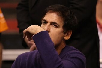 PHOENIX, AZ - DECEMBER 21:  Dallas Mavericks owner, Mark Cuban reacts during the NBA game against the Phoenix Suns at US Airways Center on December 21, 2013 in Phoenix, Arizona.  The Suns defeated the Mavericks 123-108. NOTE TO USER: User expressly acknow