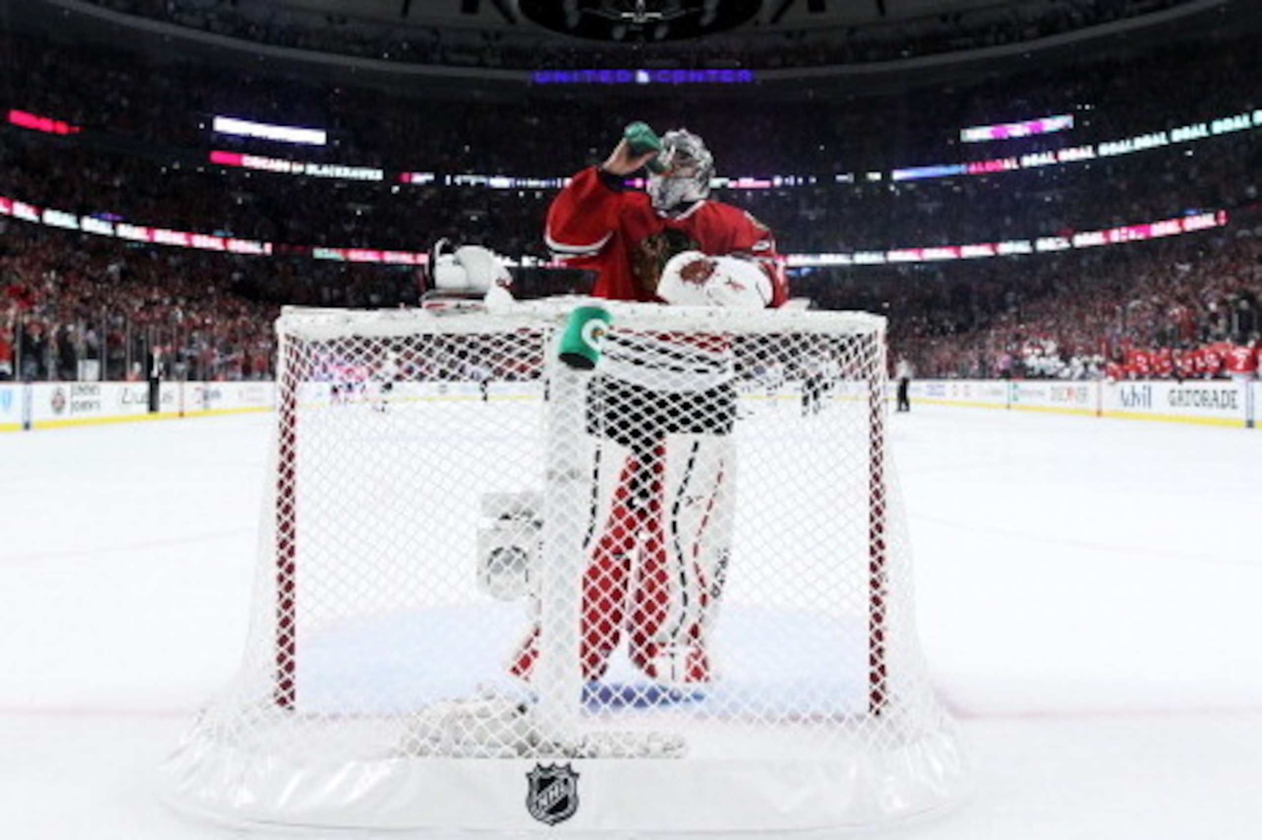 CHICAGO, IL - MAY 21: Corey Crawford #50 of the Chicago Blackhawks takes a drink in the first period against the Los Angeles Kings in Game Two of the Western Conference Final during the 2014 Stanley Cup Playoffs at United Center on May 21, 2014 in Chicag CHICAGO, IL - MAY 21: Corey Crawford #50 of the Chicago Blackhawks takes a drink in the first period against the Los Angeles Kings in Game Two of the Western Conference Final during the 2014 Stanley Cup Playoffs at United Center on May 21, 2014 in Chicag