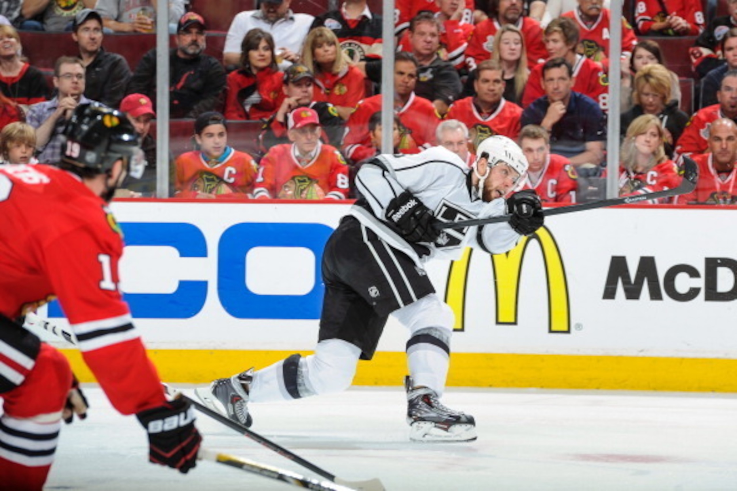 CHICAGO, IL - MAY 21: Jake Muzzin #6 of the Los Angeles Kings shoots the puck, resulting in a goal against the Chicago Blackhawks in Game Two of the Western Conference Final during the 2014 NHL Stanley Cup Playoffs at the United Center on May 21, 2014 in 