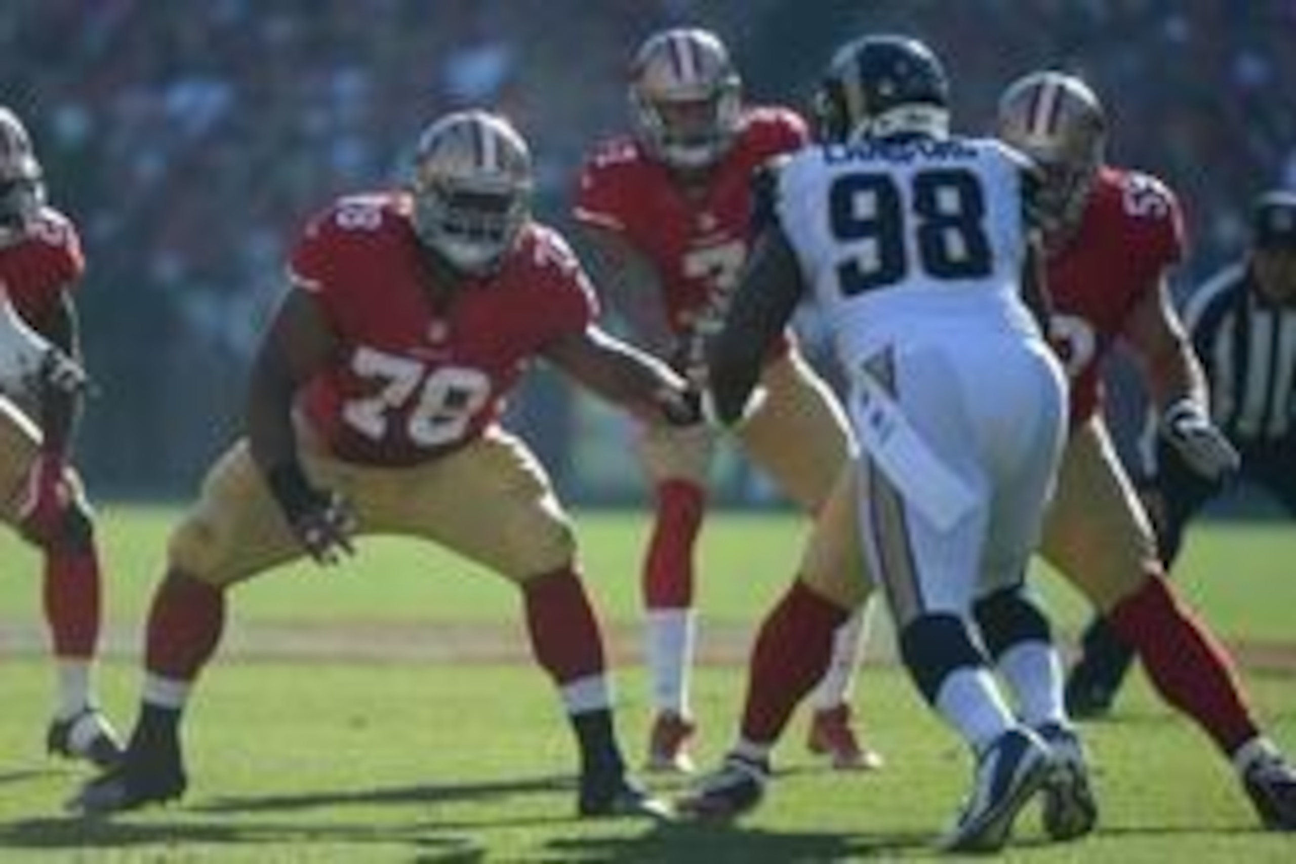 December 1, 2013; San Francisco, CA, USA; San Francisco 49ers guard Joe Looney (78) blocks against St. Louis Rams defensive tackle Kendall Langford (98) during the first quarter at Candlestick Park. The 49ers defeated the Rams 23-13. Mandatory Credit: Kyl