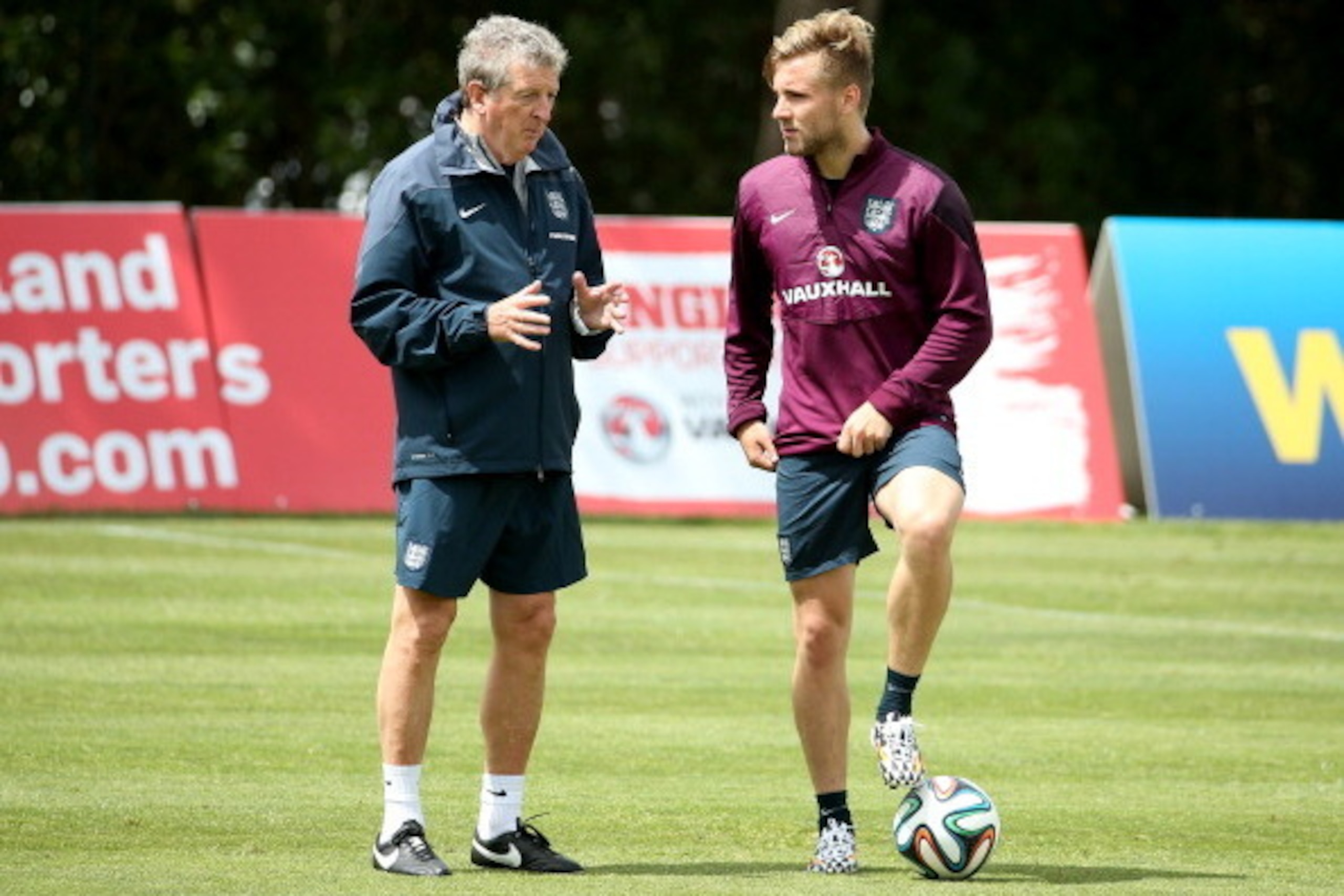 VALE DO LOBO, ALGARVE, PORTUGAL - MAY 21:  Manager Roy Hodgson talks with Luke Shaw during a training session at the England pre-World Cup Training Camp at the Vale Do Lobo Resort on May 21, 2014 in Vale Do Lobo, Algarve, Portugal.  (Photo by Richard Heat