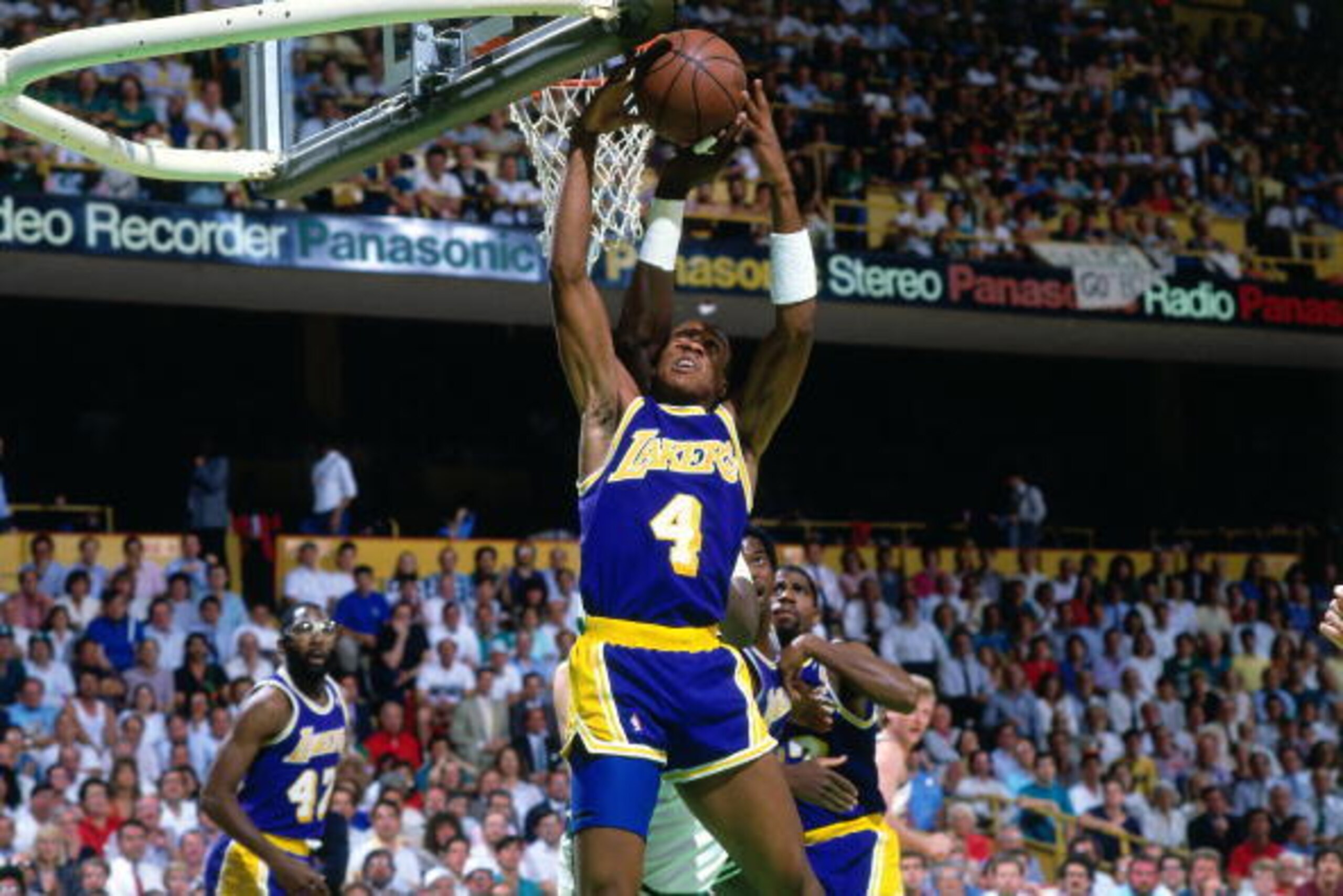 BOSTON - 1987:  Byron Scott #4 of the Los Angeles Lakers rebounds against the Boston Celtics during the 1987 NBA Finals at the Boston Garden in Boston, Massachusetts. The Los Angeles Lakers defeated the Boston Celtics 4-2 to win the NBA Championship. NOTE