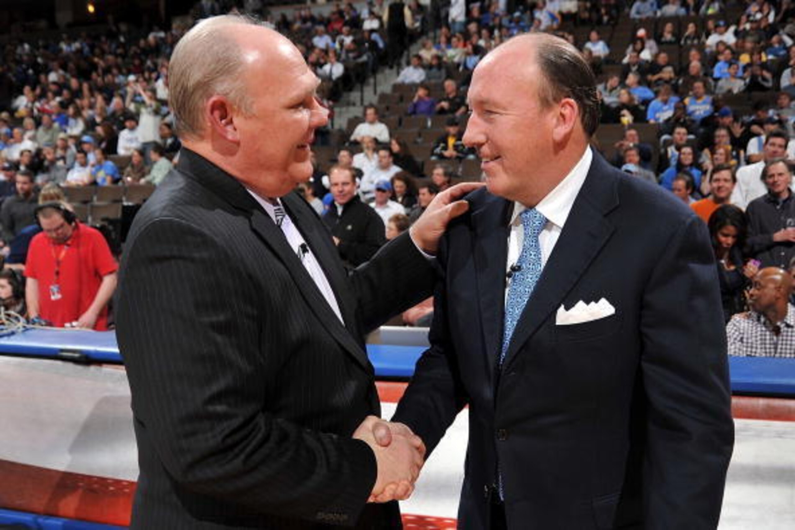 DENVER - JANUARY 21:  (L-R) Head coach George Karl of the Denver Nuggets and head coach Mike Dunleavy of the Los Angeles Clippers shake hands before the game on January 21, 2010 at the Pepsi Center in Denver, Colorado.  The Nuggets won 105-85.   NOTE TO U