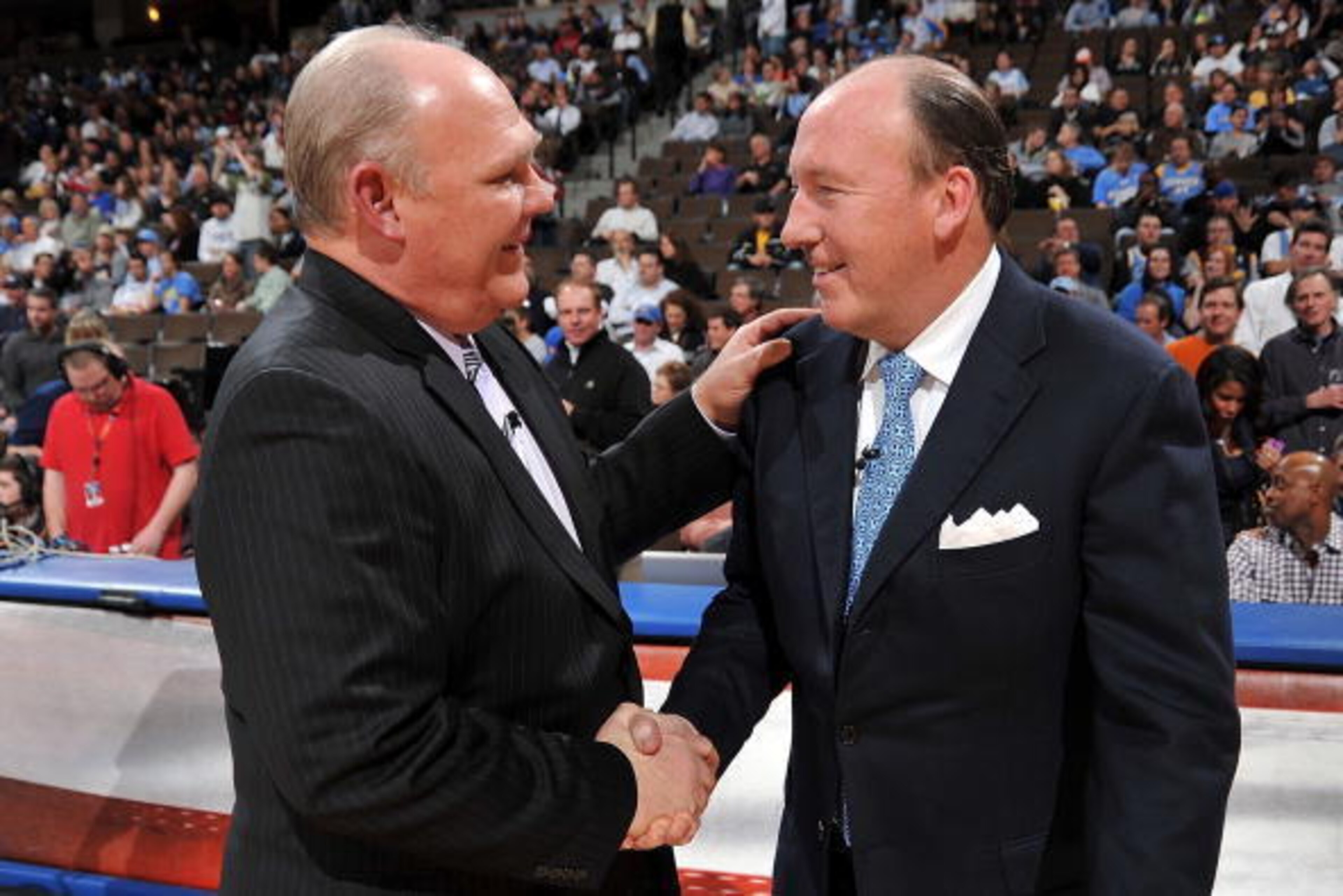 DENVER - JANUARY 21:  (L-R) Head coach George Karl of the Denver Nuggets and head coach Mike Dunleavy of the Los Angeles Clippers shake hands before the game on January 21, 2010 at the Pepsi Center in Denver, Colorado.  The Nuggets won 105-85.   NOTE TO U
