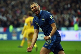 PARIS, FRANCE - NOVEMBER 19:  Karim Benzema of France celebrates scoring during the FIFA 2014 World Cup Qualifier Play-off second leg match between France and Ukraine at the Stade de France on November 19, 2013 in Paris, France.  (Photo by Bryn Lennon/Get