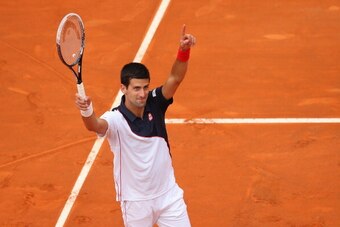 ROME, ITALY - MAY 18:  Novak Djokovic of Serbia celebrates at match point as he defeated Rafael Nadal of Spain in the final during day eight of the Internazionali BNL d'Italia tennis 2014 on May 18, 2014 in Rome, Italy.  (Photo by Julian Finney/Getty Imag