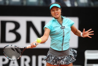 ROME, ITALY - MAY 16:  Li Na of China in action in her match against Sara Errani of Italy during day six of the Internazionali BNL d'Italia tennis 2014 on May 16, 2014 in Rome, Italy.  (Photo by Julian Finney/Getty Images)