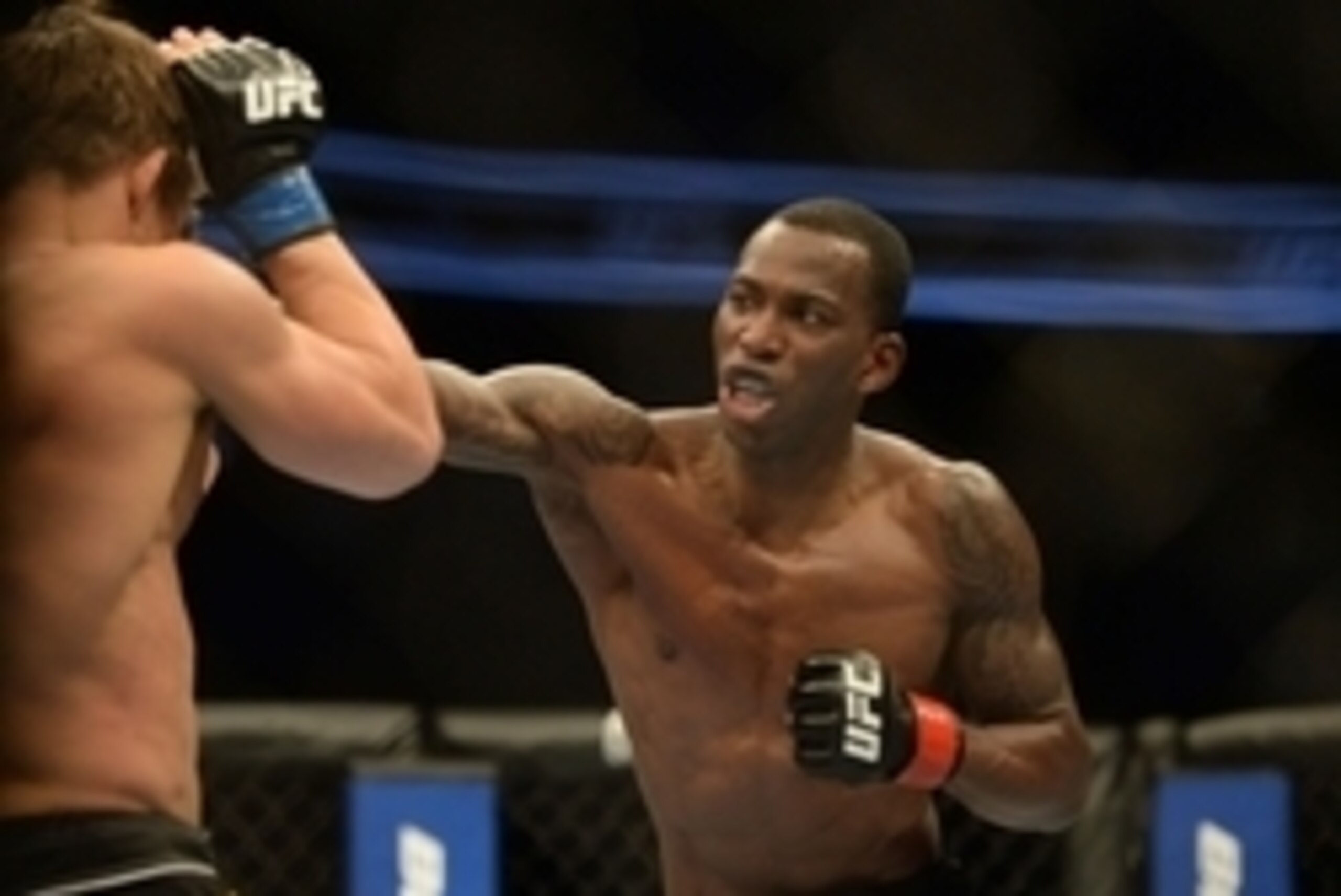 Apr 20, 2013; San Jose, CA, USA; Anthony Njokuani (right) fights Roger Bowling (left) during the lightweight bout prelims of the UFC on Fuel TV at HP Pavilion. Mandatory Credit: Kyle Terada-USA TODAY Sports
