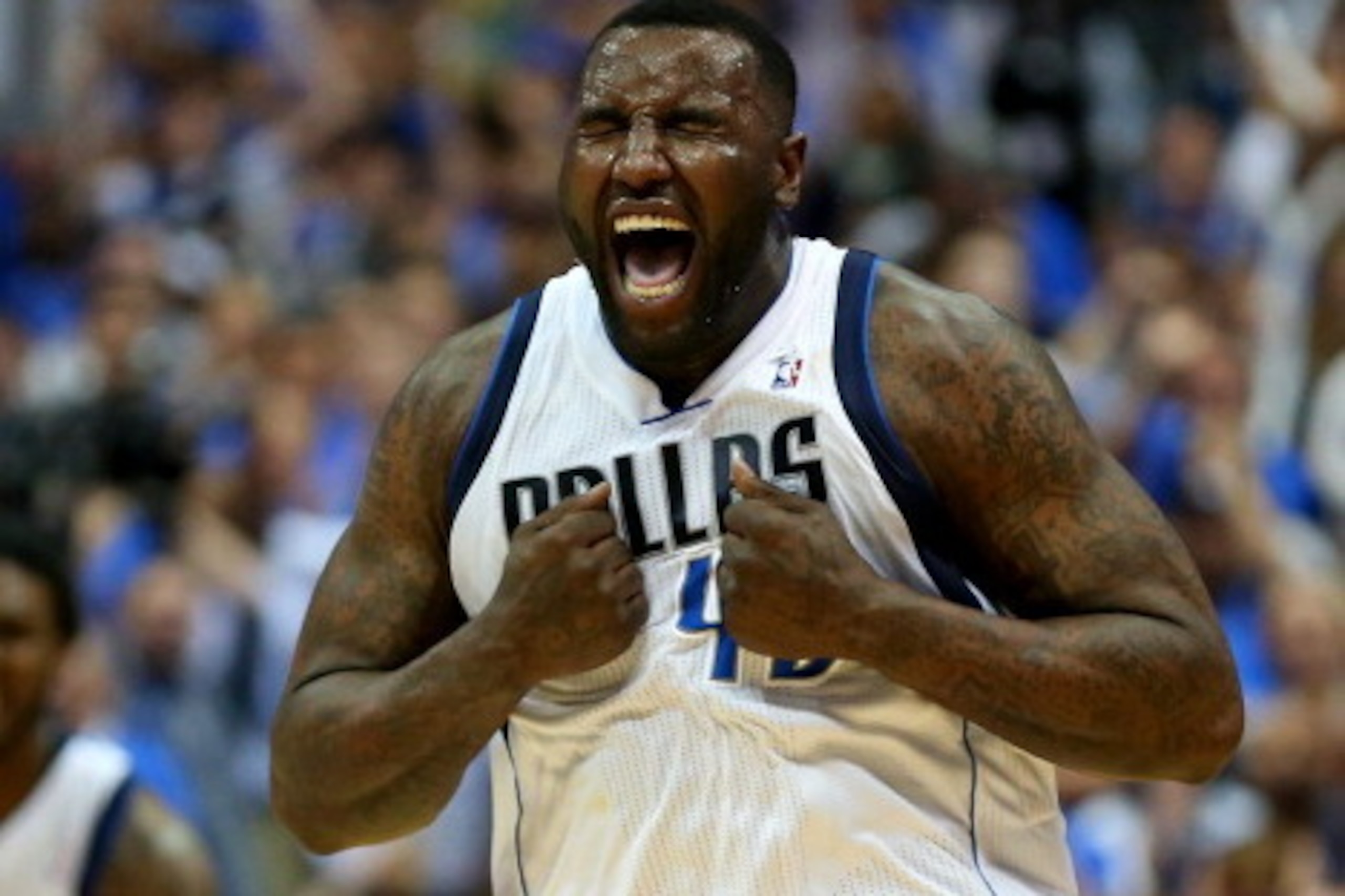 DALLAS, TX - APRIL 28:  DeJuan Blair #45 of the Dallas Mavericks reacts during play against the San Antonio Spurs in Game Four of the Western Conference Quarterfinals during the 2014 NBA Playoffs at American Airlines Center on April 28, 2014 in Dallas, Te