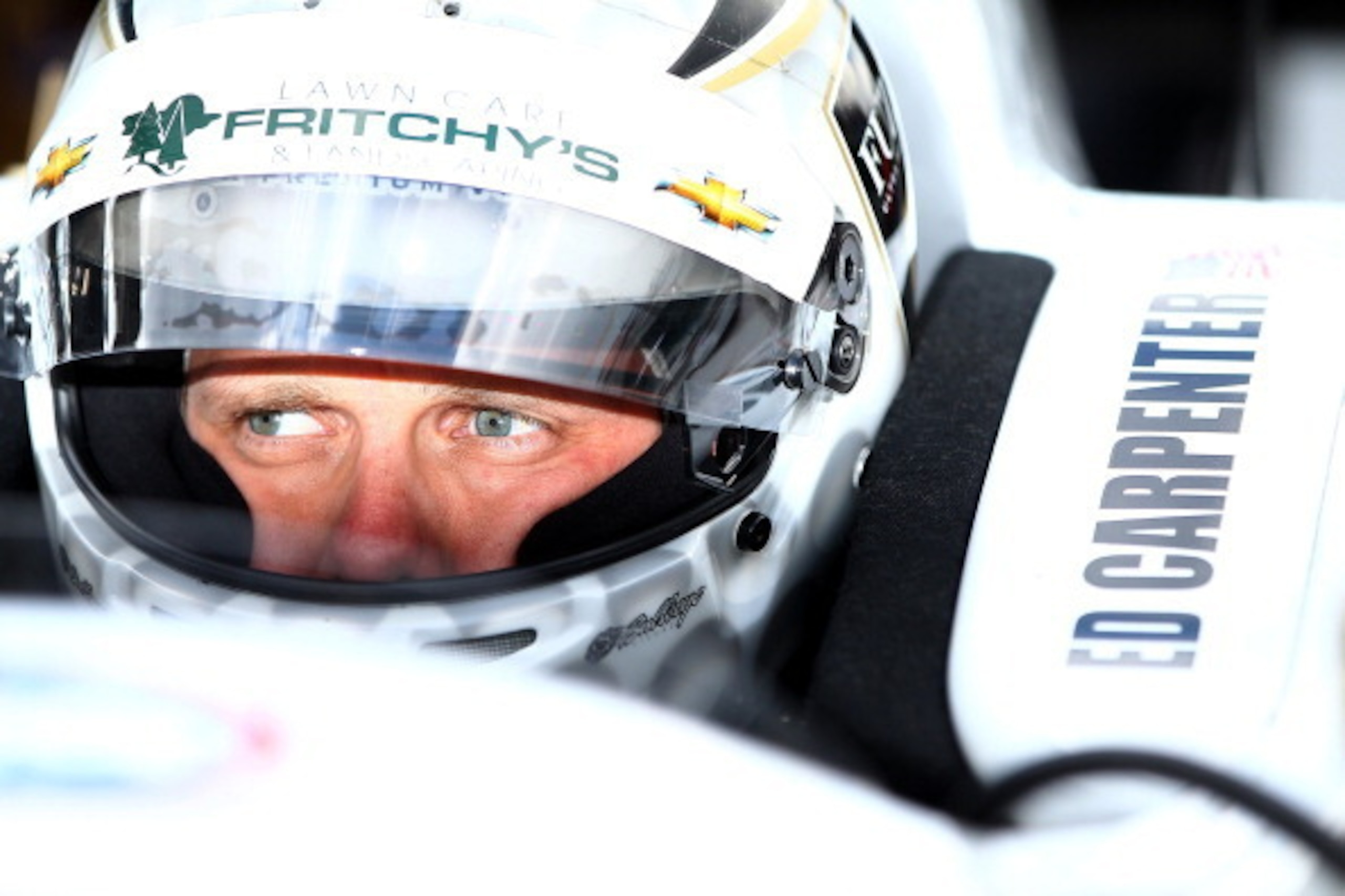 INDIANAPOLIS - MAY 17:  Ed Carpenter, driver of the #20 Fuzzy's Vodka Ed Carpenter Racing Chevrolet Dallara waits to qualify for the 98th Indianapolis 500 Mile Race on May 17, 2014 at the Indianapolis Motor Speedway in Indianapolis, Indiana.  (Photo by Jo