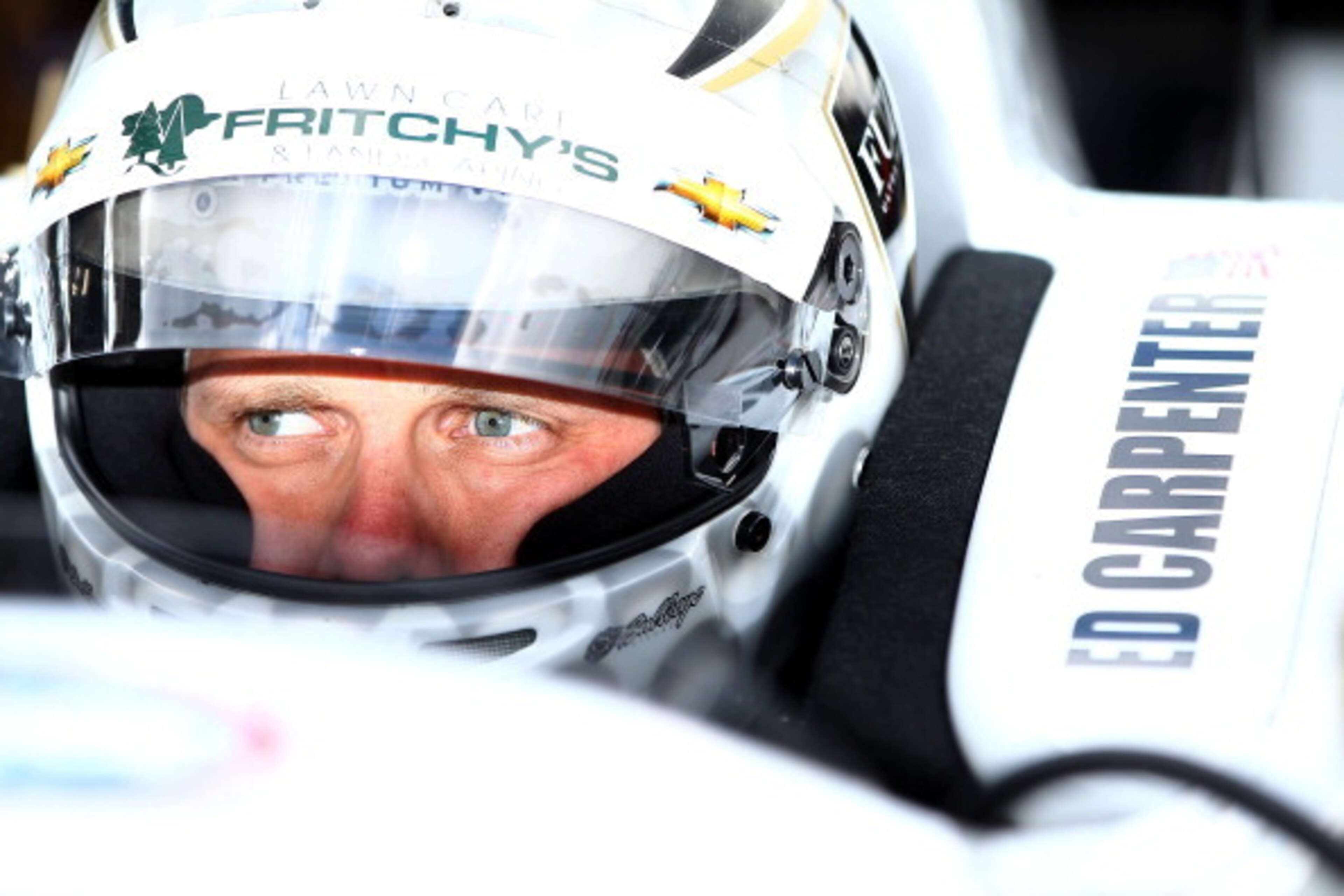 INDIANAPOLIS - MAY 17:  Ed Carpenter, driver of the #20 Fuzzy's Vodka Ed Carpenter Racing Chevrolet Dallara waits to qualify for the 98th Indianapolis 500 Mile Race on May 17, 2014 at the Indianapolis Motor Speedway in Indianapolis, Indiana.  (Photo by Jo