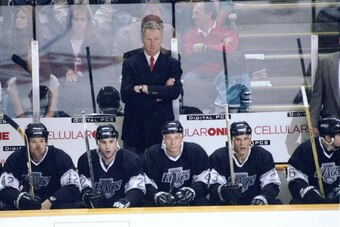 24 Mar 1998:  Coach Larry Robinson of the Los Angeles Kings looks on during a game against the San Jose Sharks at the San Jose  Arena in San Jose, California. The Kings defeated the Sharks 4-3. Mandatory Credit: Otto Greule Jr.  /Allsport
