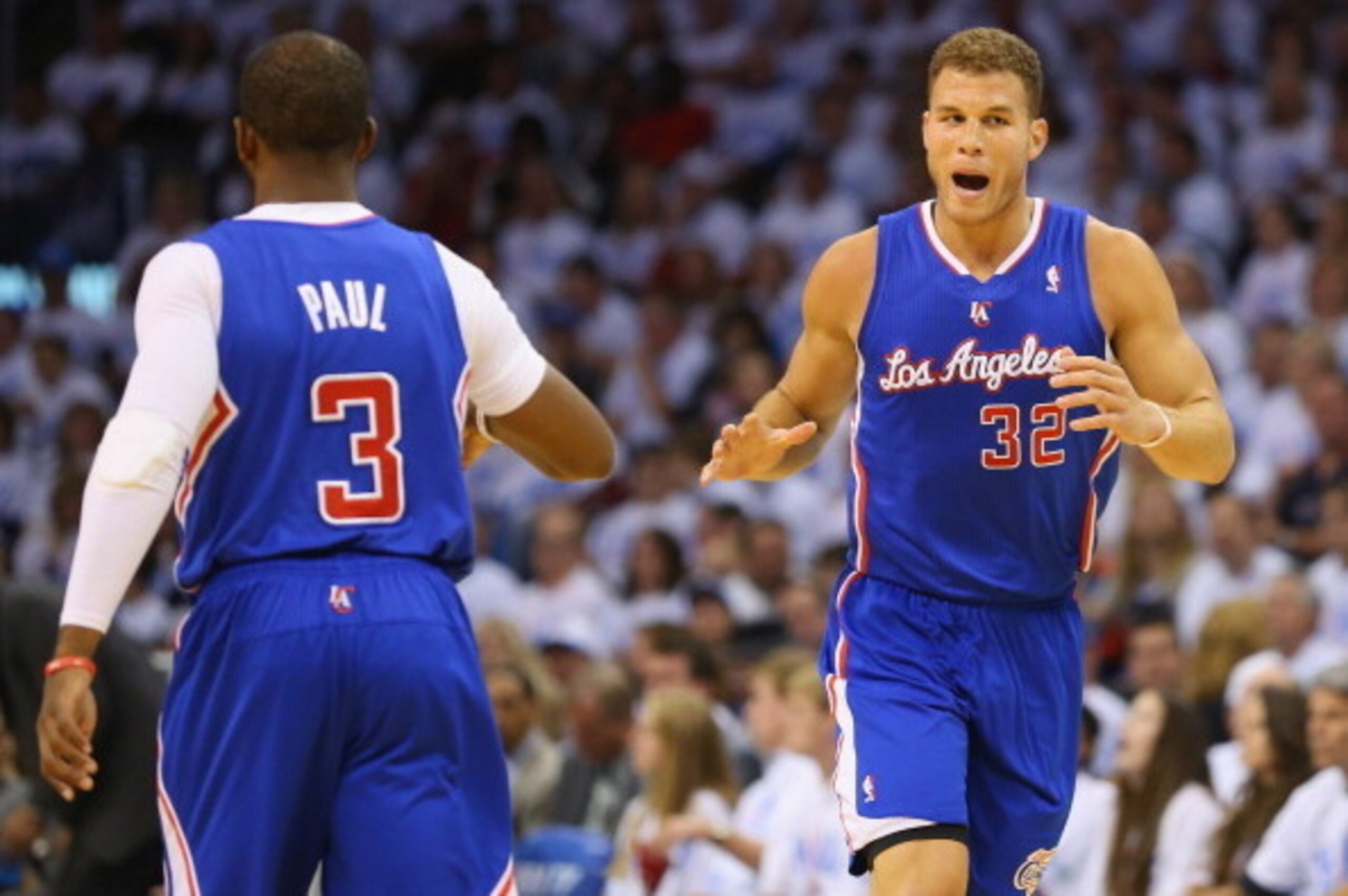 OKLAHOMA CITY, OK - MAY 13:  Chris Paul #3 reacts with Blake Griffin #32 of the Los Angeles Clippers against the Oklahoma City Thunder in Game Five of the Western Conference Semifinals during the 2014 NBA Playoffs at Chesapeake Energy Arena on May 13, 201