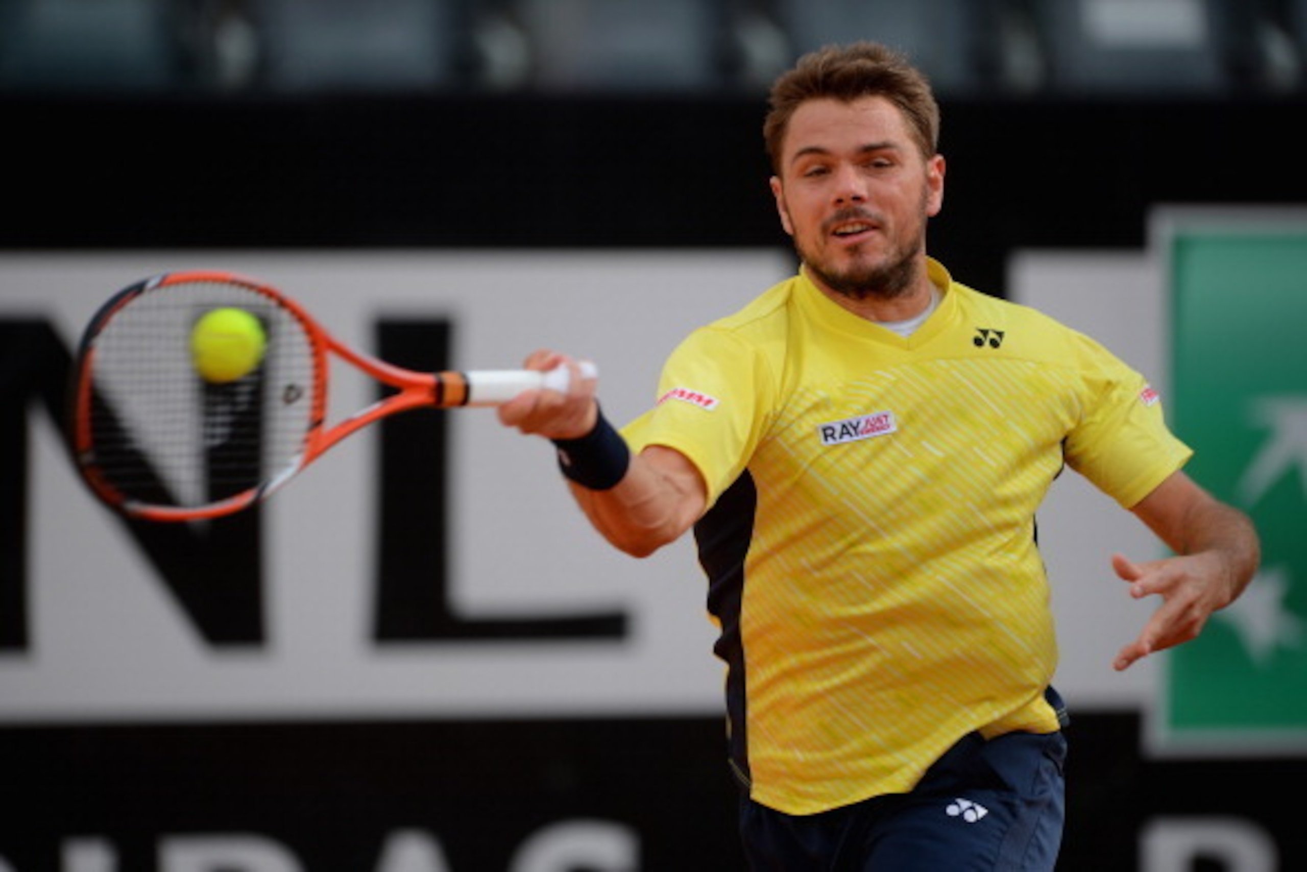 ROME, ITALY - MAY 13: Stanislas Wawrinka of Switzerland in action during his match against Pere Riba of Spain during day 3 of the Internazionali BNL d'Italia 2014 on May 13, 2014 in Rome, Italy. (Photo by Michael Regan/Getty Images) ROME, ITALY - MAY 13: Stanislas Wawrinka of Switzerland in action during his match against Pere Riba of Spain during day 3 of the Internazionali BNL d'Italia 2014 on May 13, 2014 in Rome, Italy. (Photo by Michael Regan/Getty Images)