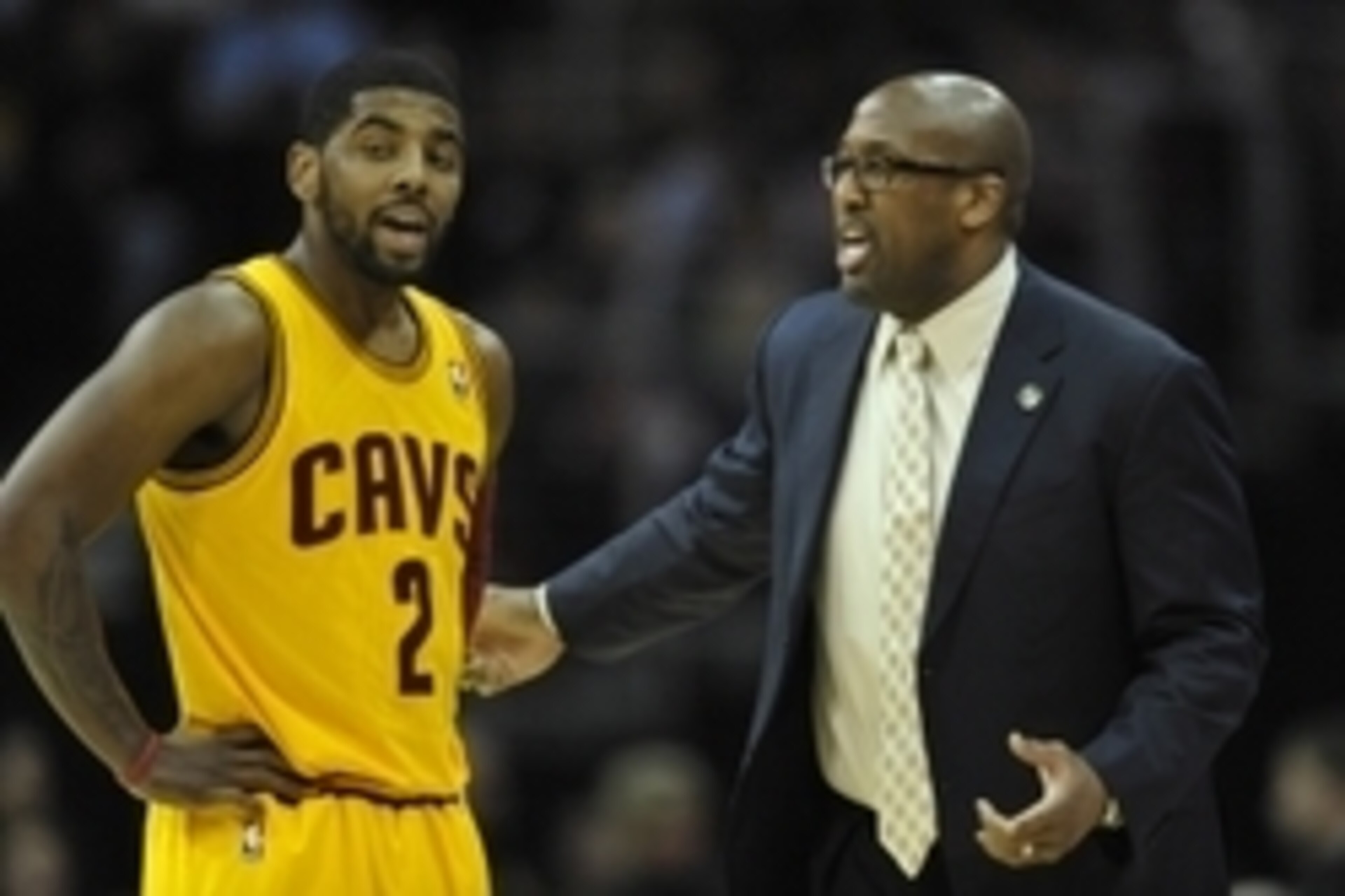 Apr 5, 2014; Cleveland, OH, USA; Cleveland Cavaliers head coach Mike Brown talks to guard Kyrie Irving (2) in the first quarter against the Charlotte Bobcats at Quicken Loans Arena. Mandatory Credit: David Richard-USA TODAY Sports Apr 5, 2014; Cleveland, OH, USA; Cleveland Cavaliers head coach Mike Brown talks to guard Kyrie Irving (2) in the first quarter against the Charlotte Bobcats at Quicken Loans Arena. Mandatory Credit: David Richard-USA TODAY Sports