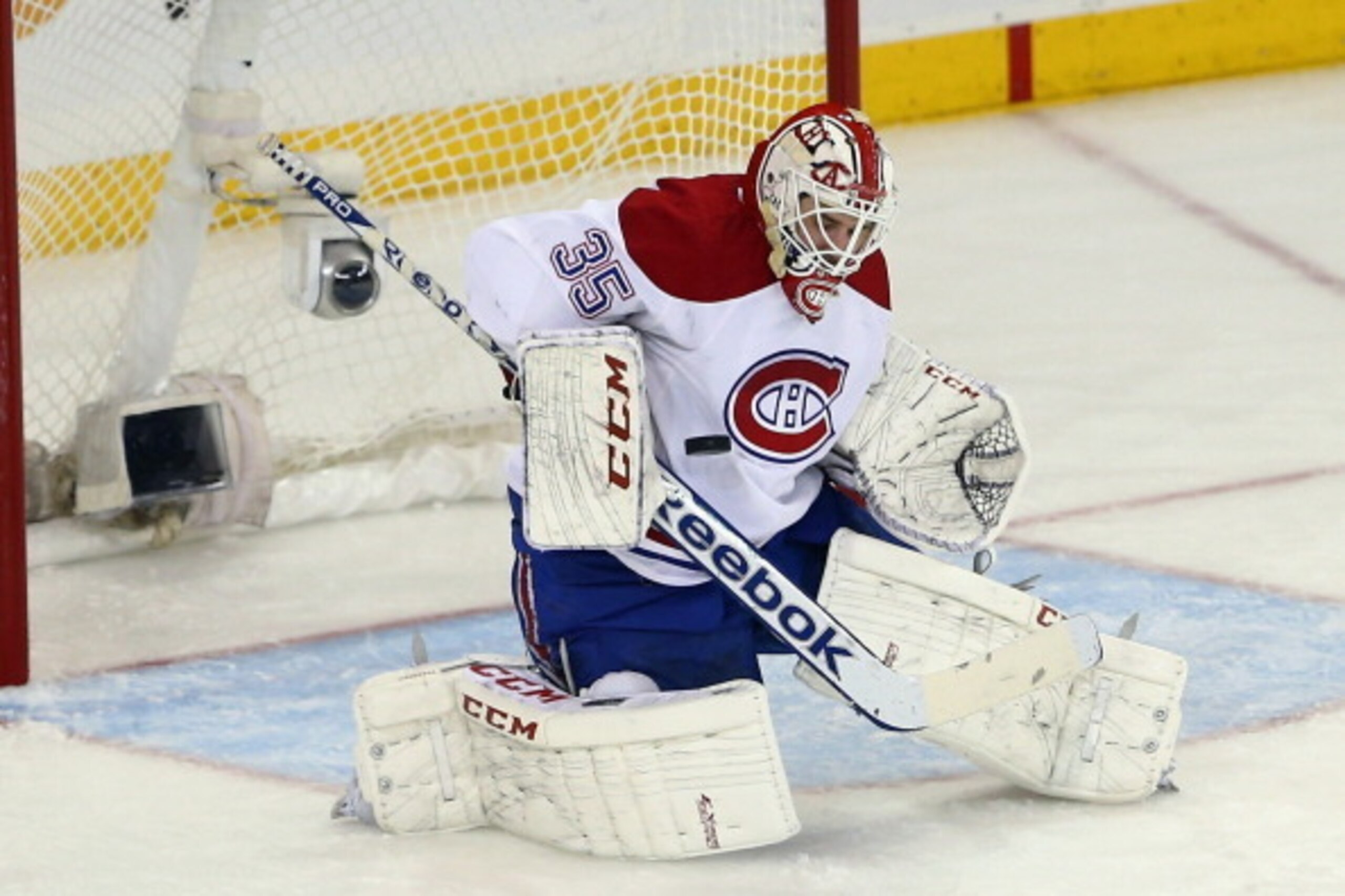 NEW YORK, NY - MAY 22:  Dustin Tokarski #35 of the Montreal Canadiens makes a save against the New York Rangers in Game Three of the Eastern Conference Final during the 2014 NHL Stanley Cup Playoffs at Madison Square Garden on May 22, 2014 in New York Cit