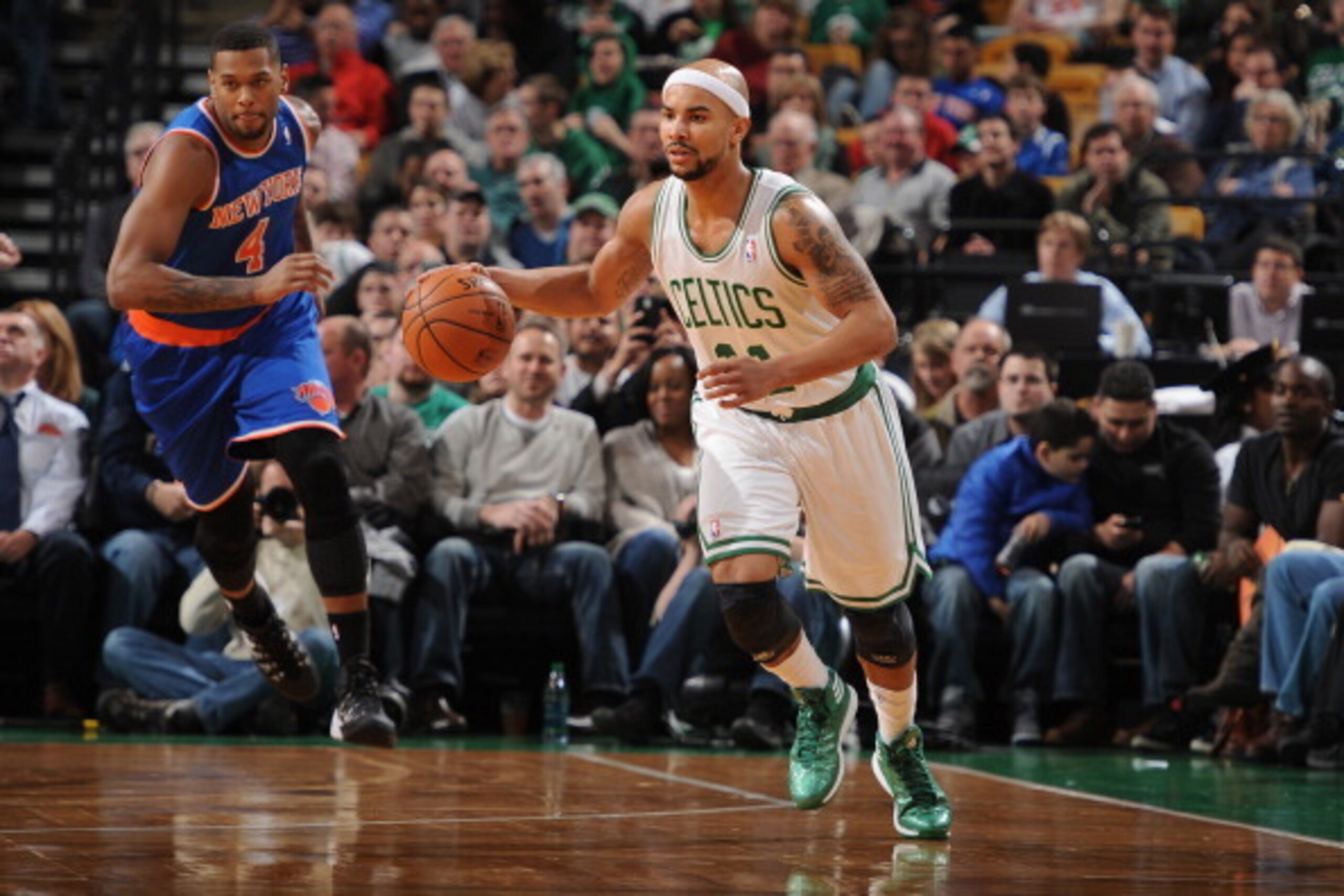 BOSTON, MA - MARCH 12: Jerryd Bayless #11 of the Boston Celtics handles the ball against the New York Knicks on March 12, 2014 at the TD Garden in Boston, Massachusetts.  NOTE TO USER: User expressly acknowledges and agrees that, by downloading and or usi