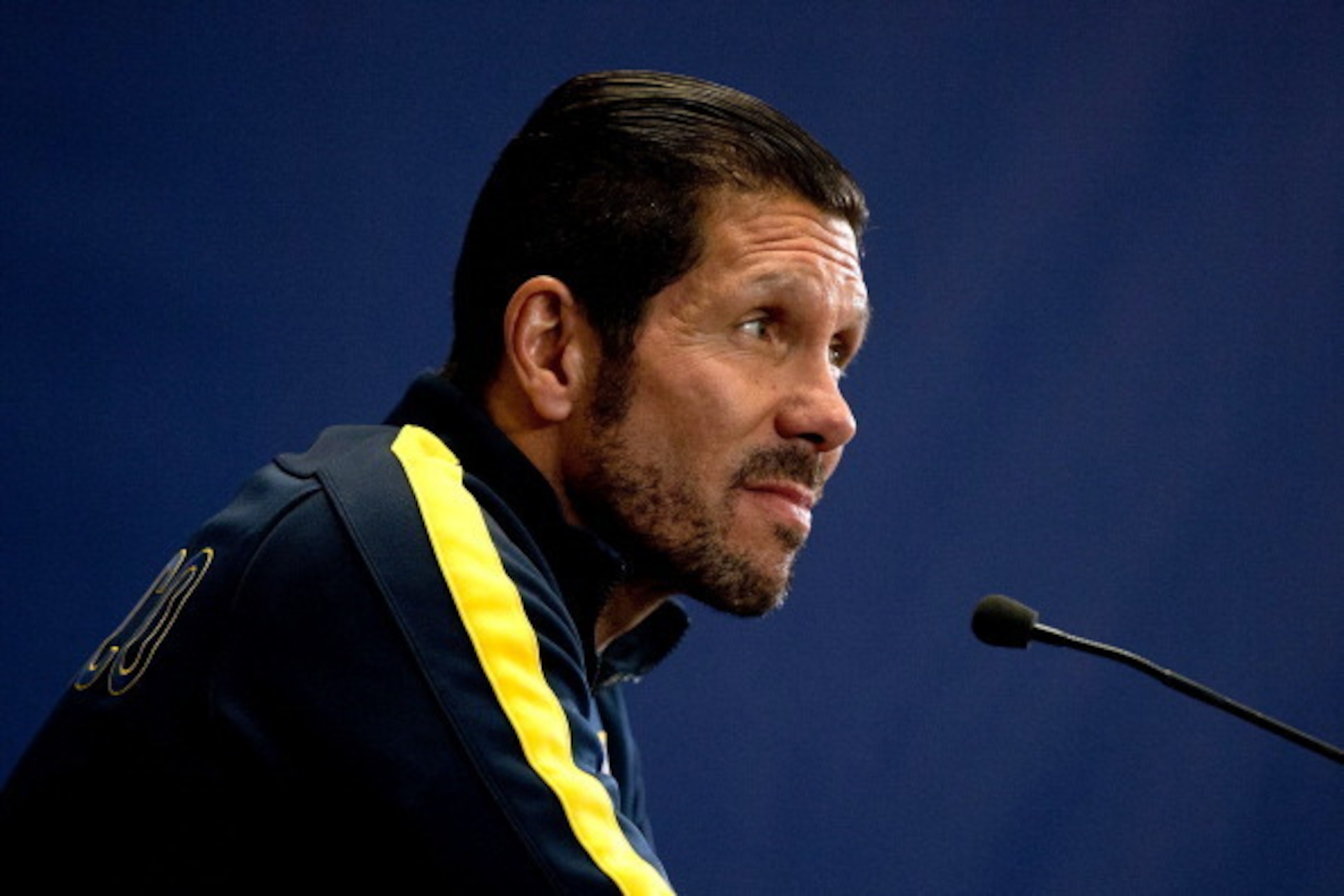MADRID, SPAIN - MAY 19:  Head coach Diego Pablo Simeone of Atletico de Madrid answers questions from the media at a Club Atletico de Madrid press conference during the Media Day prior to UEFA Champions League Final between Club Atletico de Madrid and Real