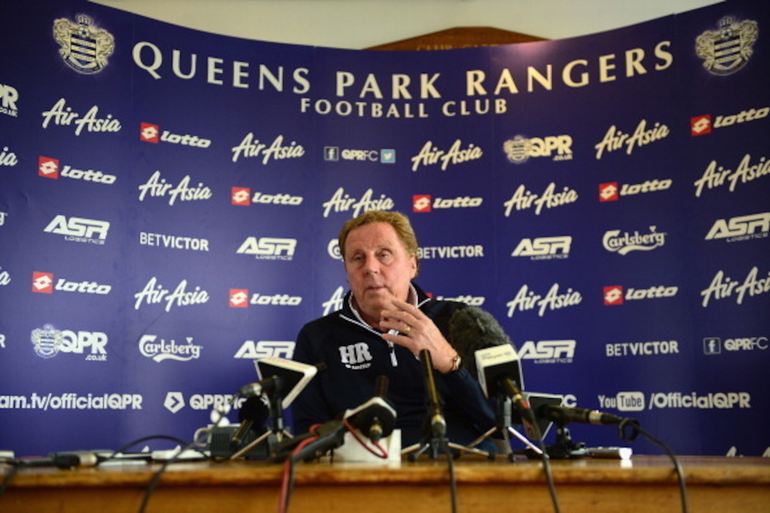 HARLINGTON, ENGLAND - MAY 22:  Harry Redknapp, Manager of Queens Park Rangers talks to the media during a Queens Park Rangers press conference on May 22, 2014 in Harlington, England.  (Photo by Jamie McDonald/Getty Images)