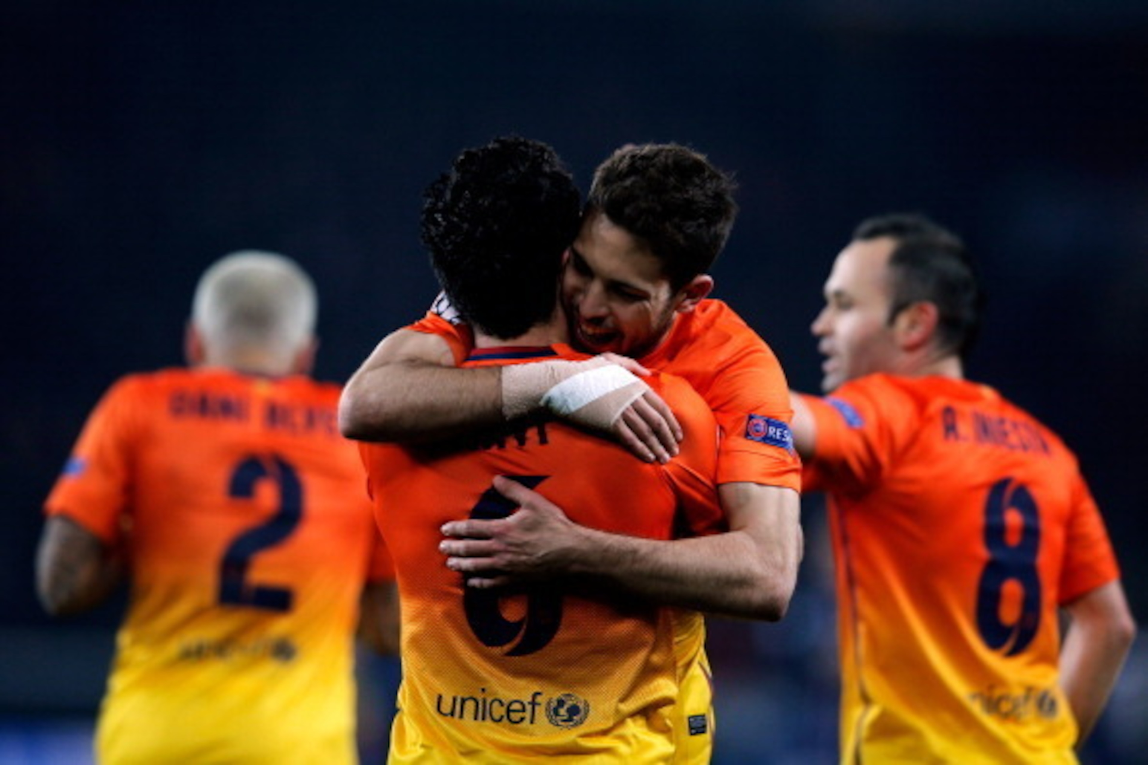 PARIS, FRANCE - APRIL 02:  Xavi (#6) of Barcelona celebrates scoring a penalty for his teams second goal with Jordi Alba during the UEFA Champions League Quarter Final match between Paris Saint-Germain and Barcelona FCB at Parc des Princes on April 2, 201