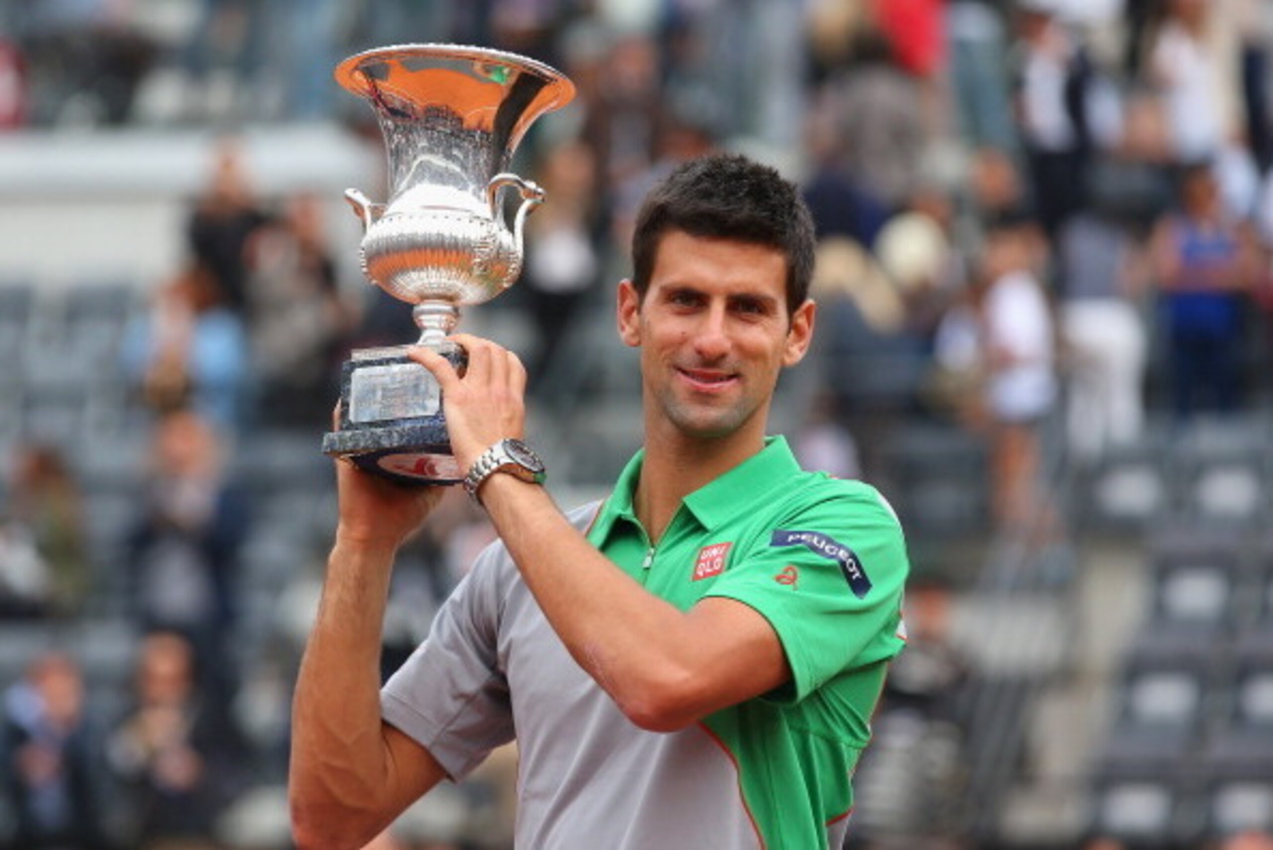 ROME, ITALY - MAY 18:  Novak Djokovic of Serbia with the trophy after defeating Rafael Nadal of Spain in the final during day eight of the Internazionali BNL d'Italia tennis 2014 on May 18, 2014 in Rome, Italy.  (Photo by Julian Finney/Getty Images)