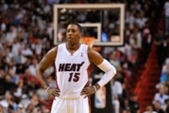 Mar 16, 2014; Miami, FL, USA; Miami Heat guard Mario Chalmers (15) takes a breather during the second half against the Houston Rockets at American Airlines Arena. Mandatory Credit: Steve Mitchell-USA TODAY Sports