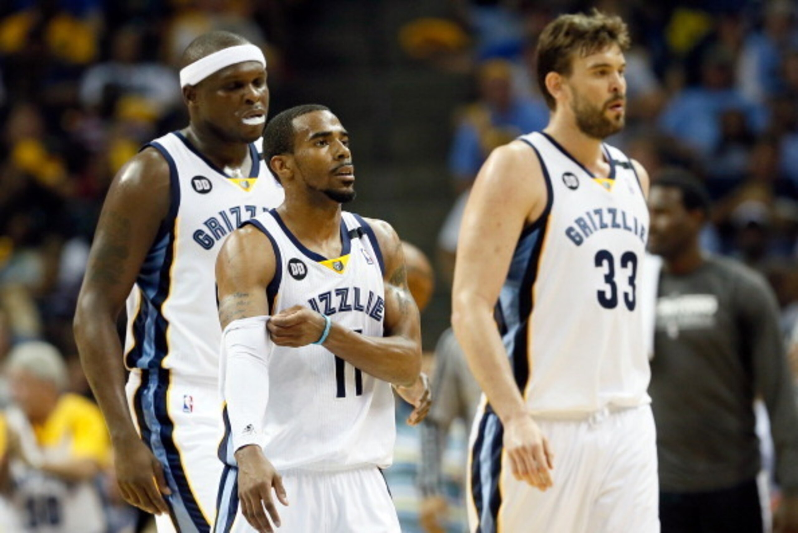 MEMPHIS, TN - MAY 27:  (L-R) Zach Randolph #50, Mike Conley #11 and Marc Gasol #33 of the Memphis Grizzlies walk back to the bench during a timeout in the first half during Game Four of the Western Conference Finals of the 2013 NBA Playoffs at the FedExFo