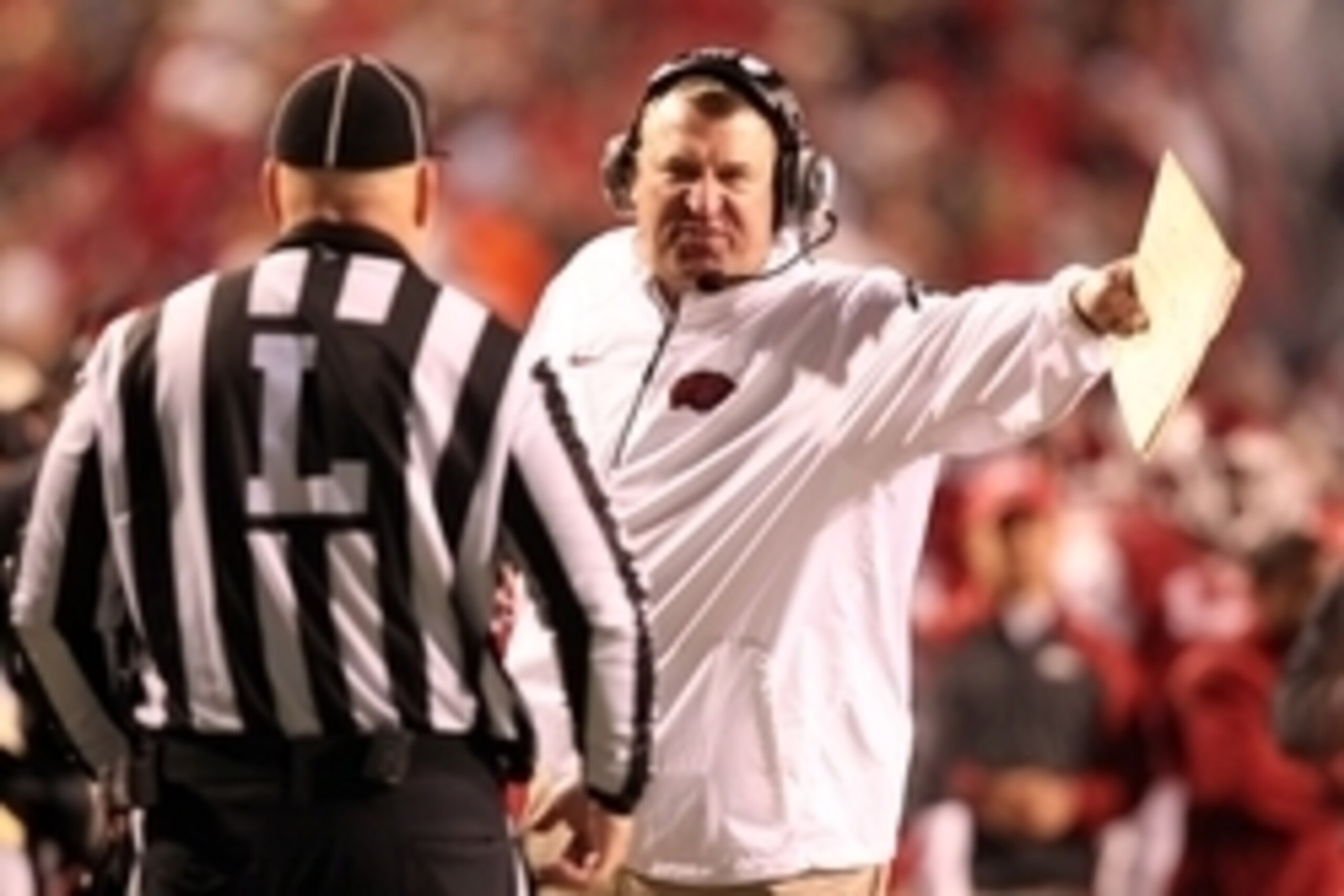 Nov 2, 2013; Fayetteville, AR, USA; Arkansas Razorbacks head coach Bret Bielema talks to an official during the game against the Auburn Tigers at Donald W. Reynolds Razorback Stadium. Auburn defeated Arkansas 35-17. Mandatory Credit: Nelson Chenault-USA T