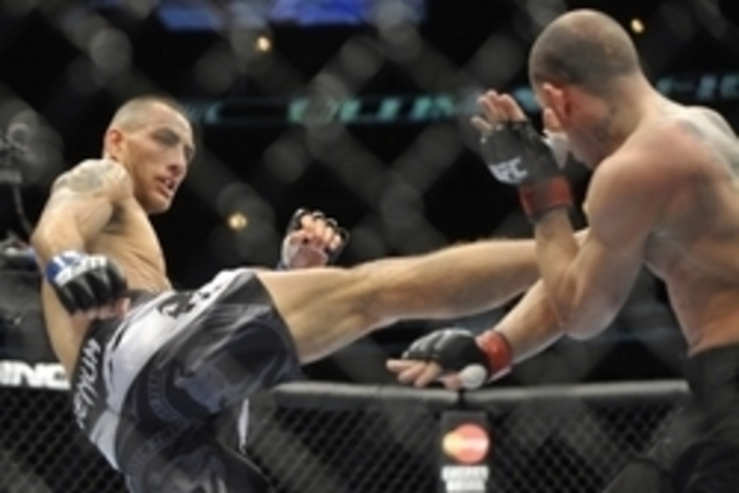 Jan 25, 2014; Chicago, IL, USA; Chico Camus (red gloves) fights Yaotzin Meza (blue gloves) during UFC on FOX 10 at the United Center. Mandatory Credit: David Banks-USA TODAY Sports Jan 25, 2014; Chicago, IL, USA; Chico Camus (red gloves) fights Yaotzin Meza (blue gloves) during UFC on FOX 10 at the United Center. Mandatory Credit: David Banks-USA TODAY Sports