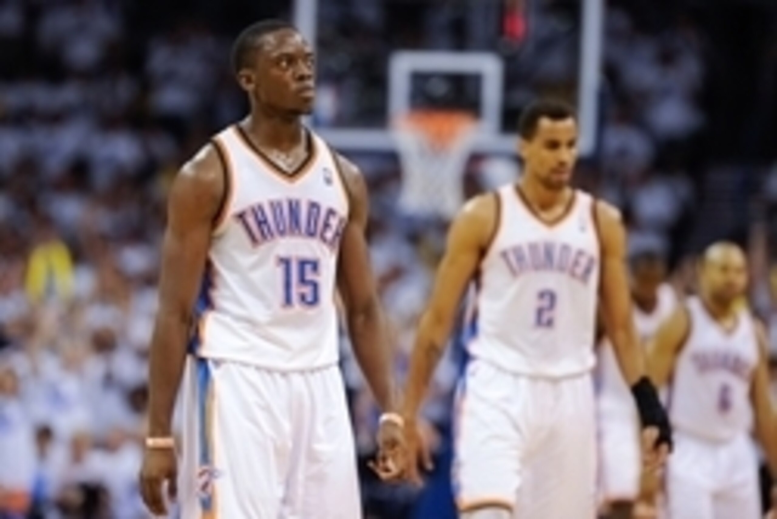 May 15, 2013; Oklahoma City, OK, USA; Oklahoma City Thunder point guard Reggie Jackson (15) and shooting guard Thabo Sefolosha (2) wait for play to resume against the Memphis Grizzlies in game five of the second round of the 2013 NBA Playoffs at Chesapeak May 15, 2013; Oklahoma City, OK, USA; Oklahoma City Thunder point guard Reggie Jackson (15) and shooting guard Thabo Sefolosha (2) wait for play to resume against the Memphis Grizzlies in game five of the second round of the 2013 NBA Playoffs at Chesapeak